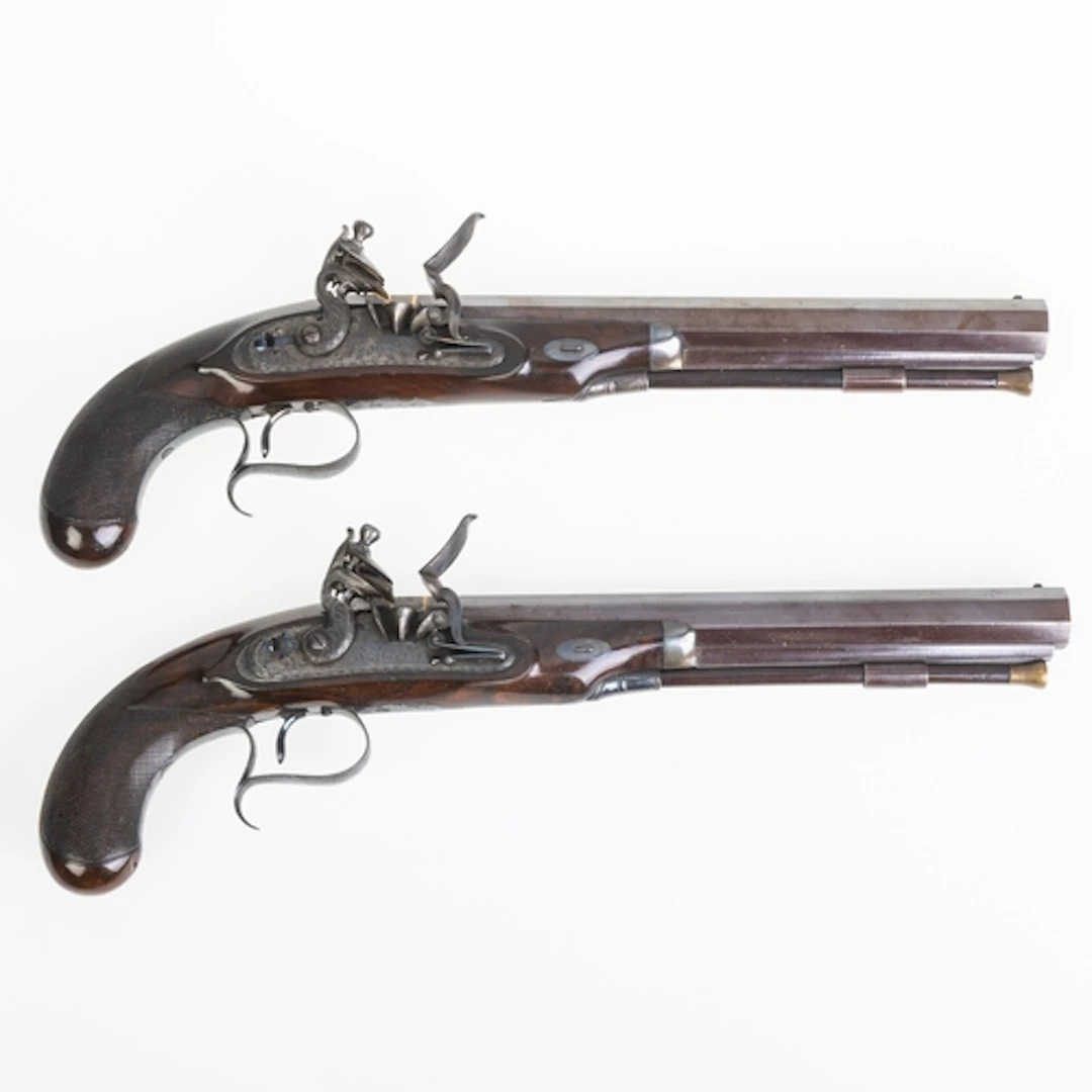 CASED PAIR OF FLINTLOCK DUELLING PISTOLS BY W. KETLAND & CO....