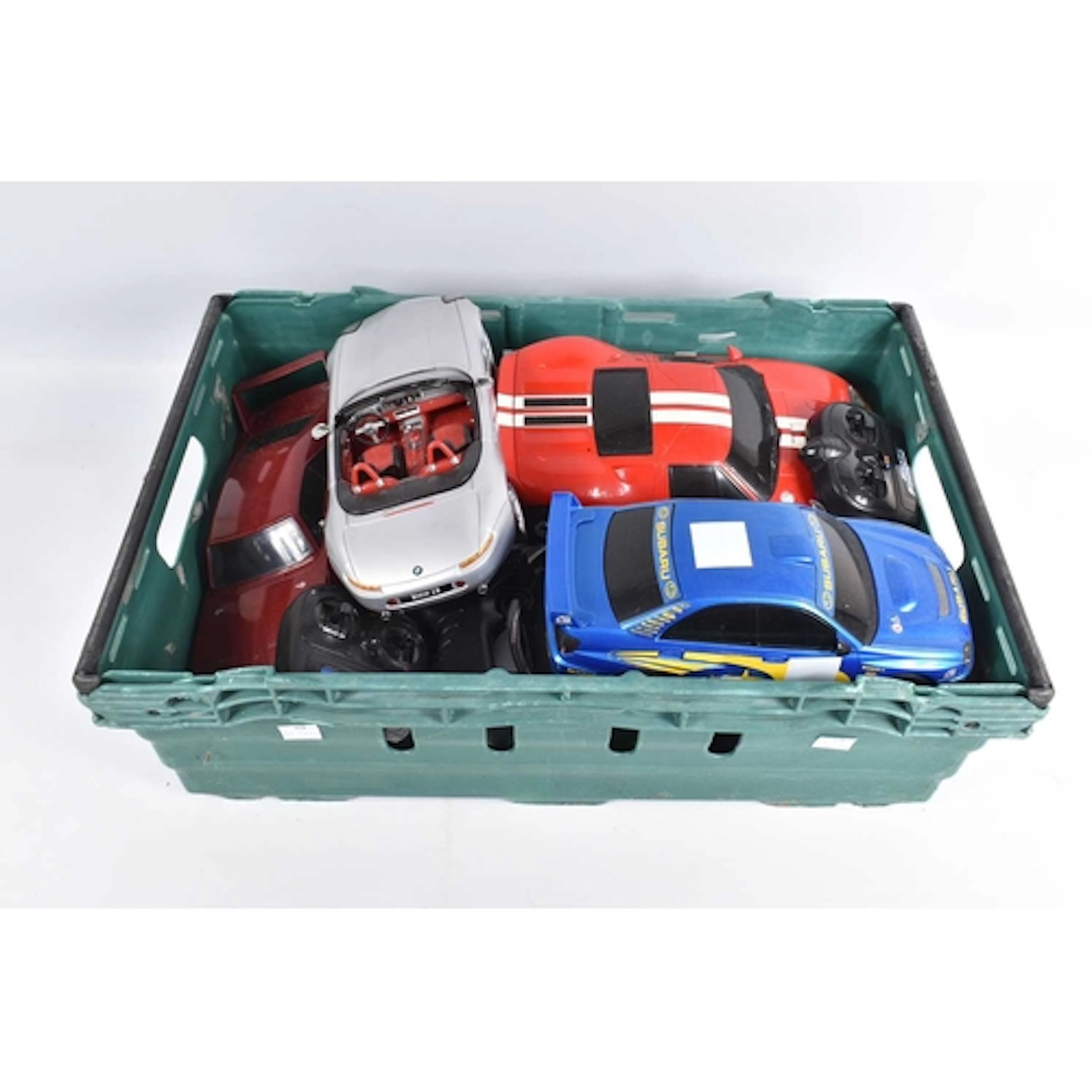 AN UNBOXED COLLECTION OF SEVEN RADIO CONTROLLED AND ELECTRIC...