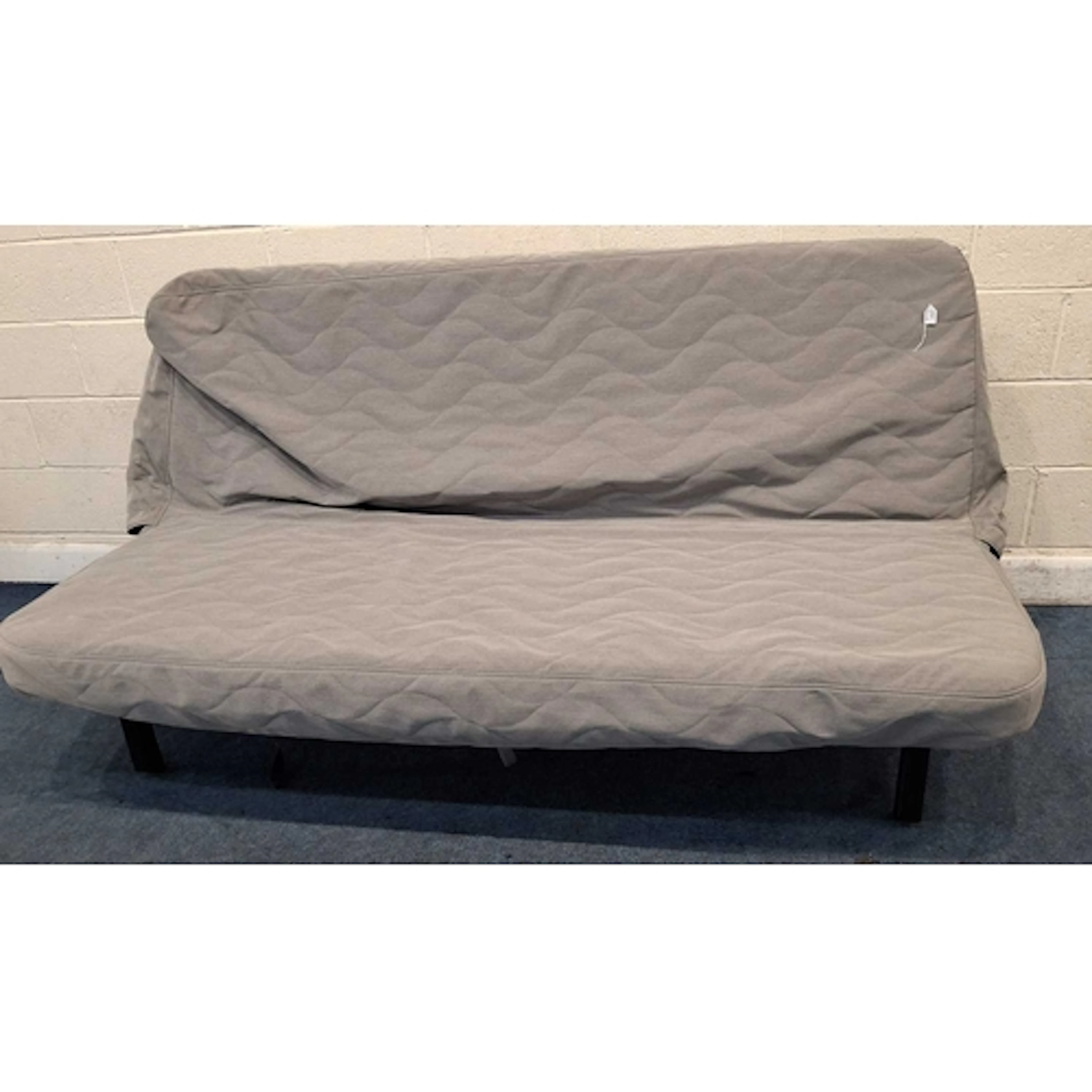 AN IKEA NYHAMN SOFA-BED, with a grey cover and tubular metal...