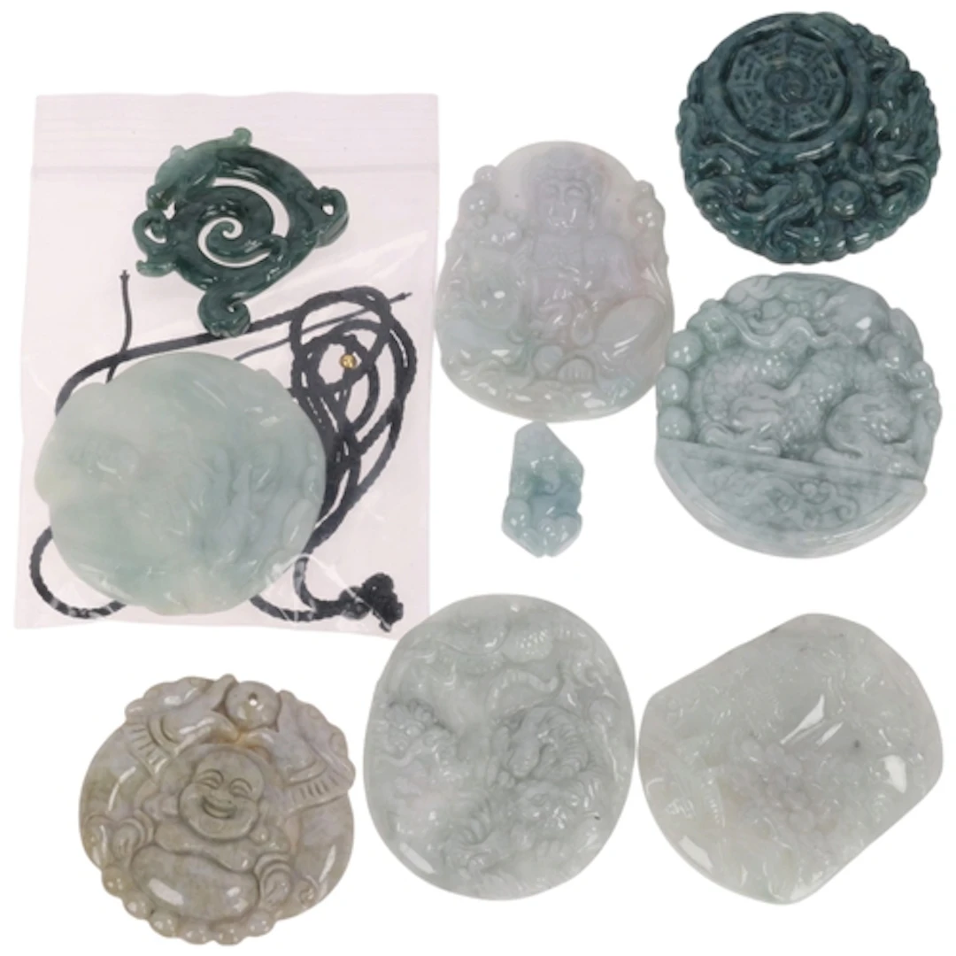 A quantity of jade pendants, including Gemporia, 200g gross