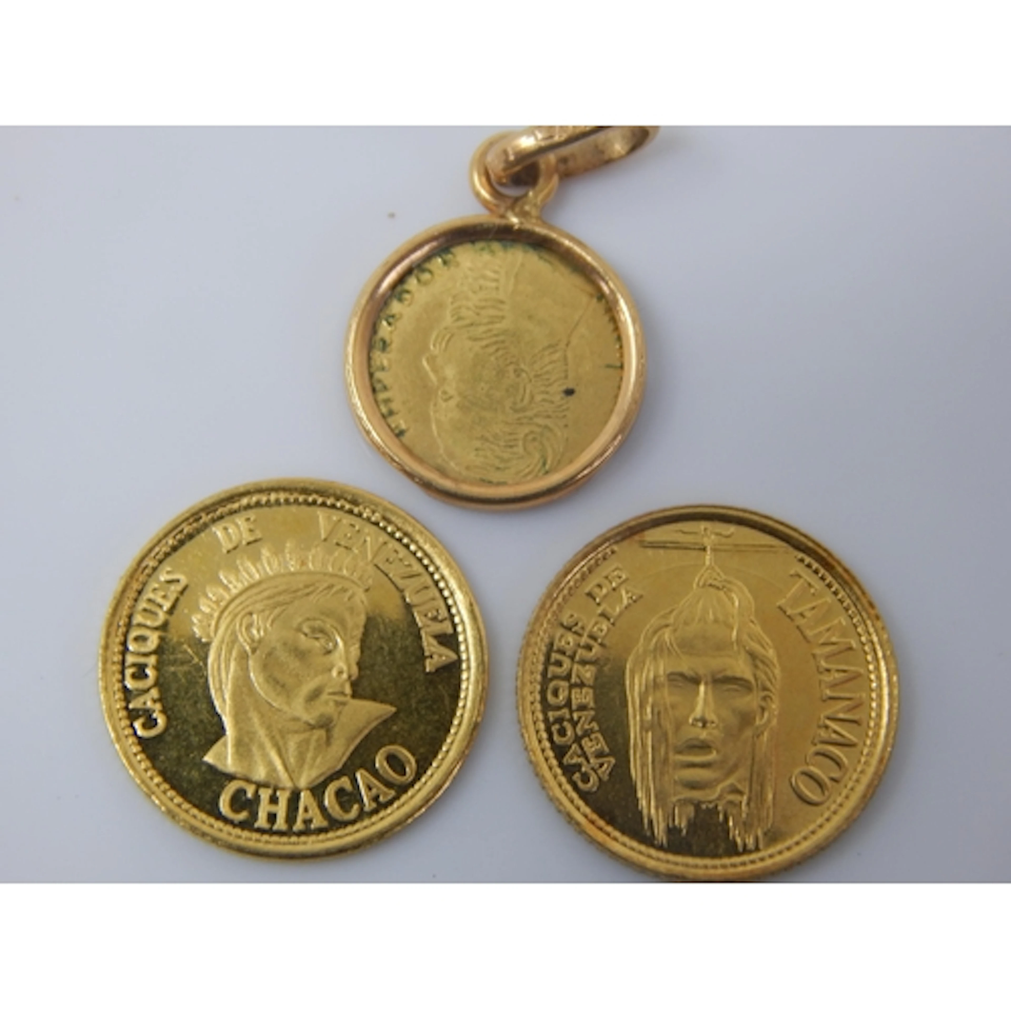 .900/1000 Gold Venezuela Coins (2) together with an 1865 Mex...