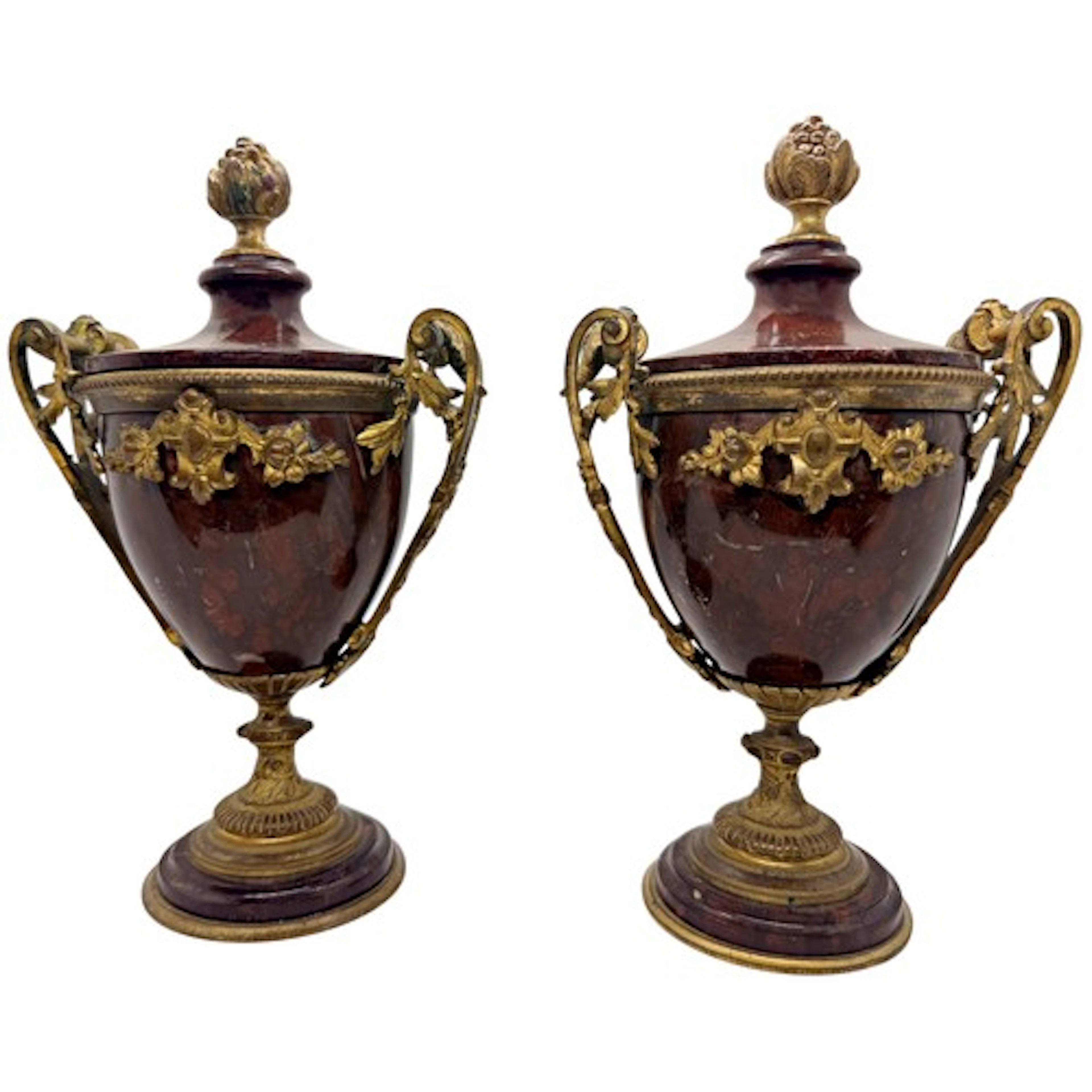 A pair of 19th century French ormolu mounted rouge marble ur...