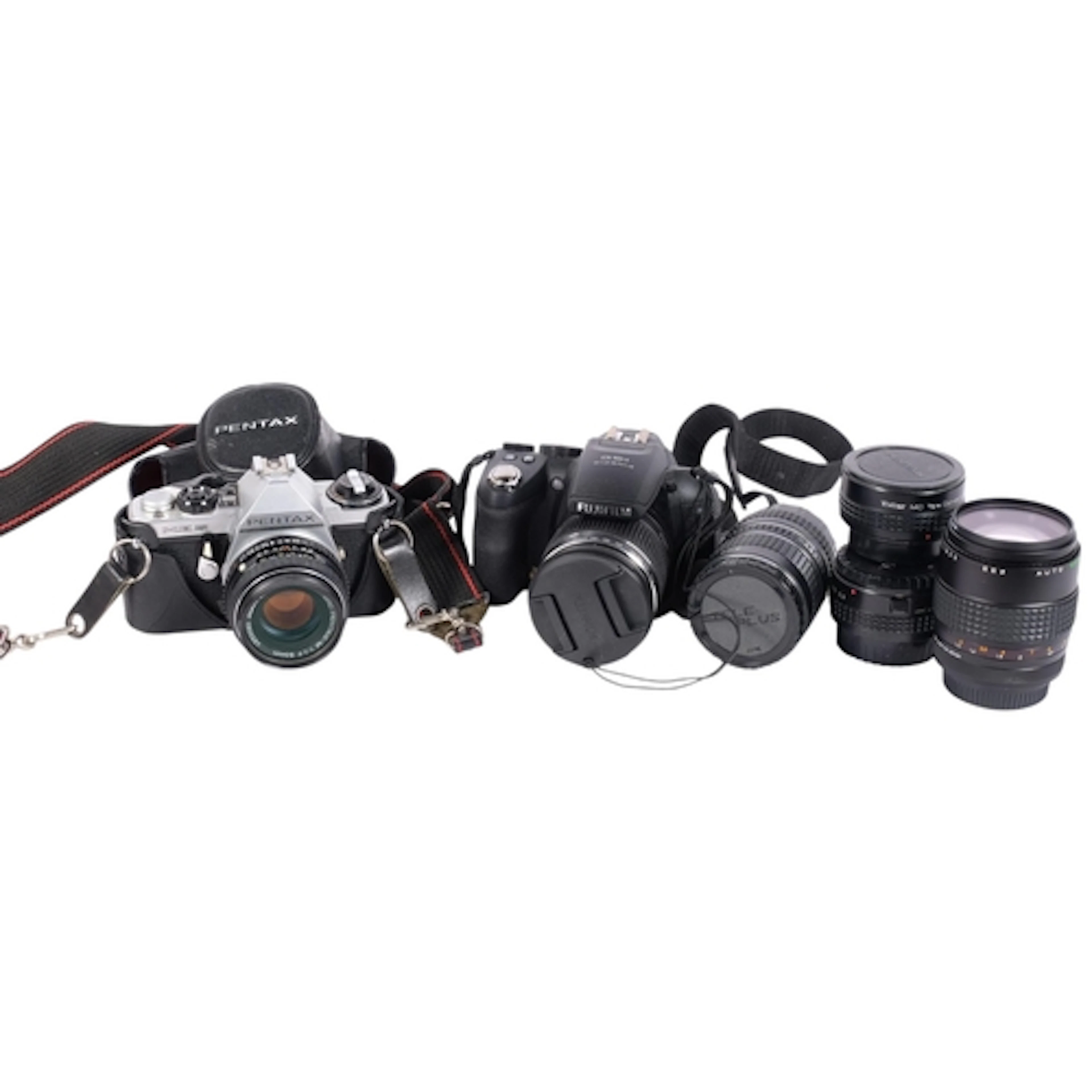 A group of cameras and accessories, including a Pentax ME Su...