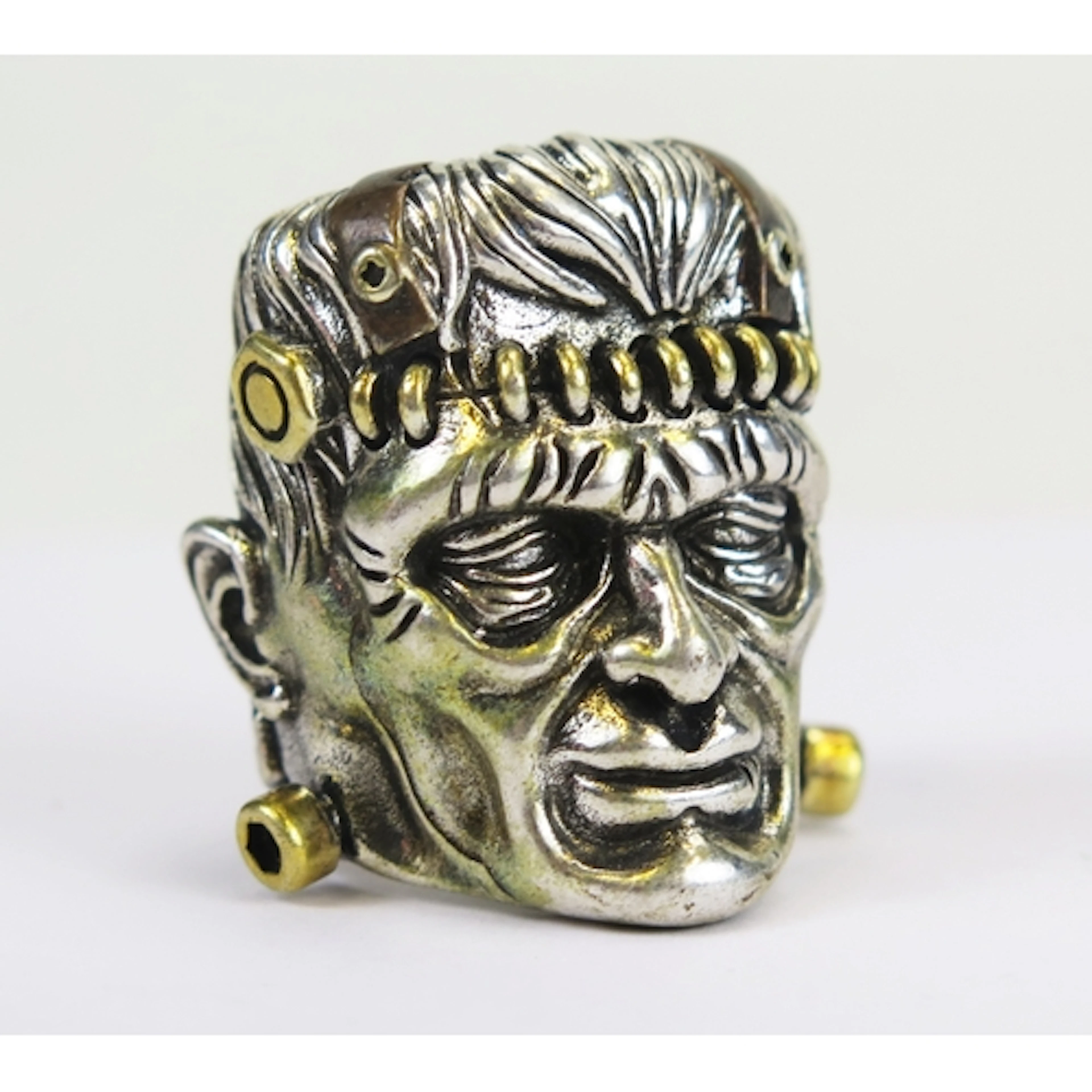 A sterling silver Frankenstein ring, size c. T.25, 30.23g
