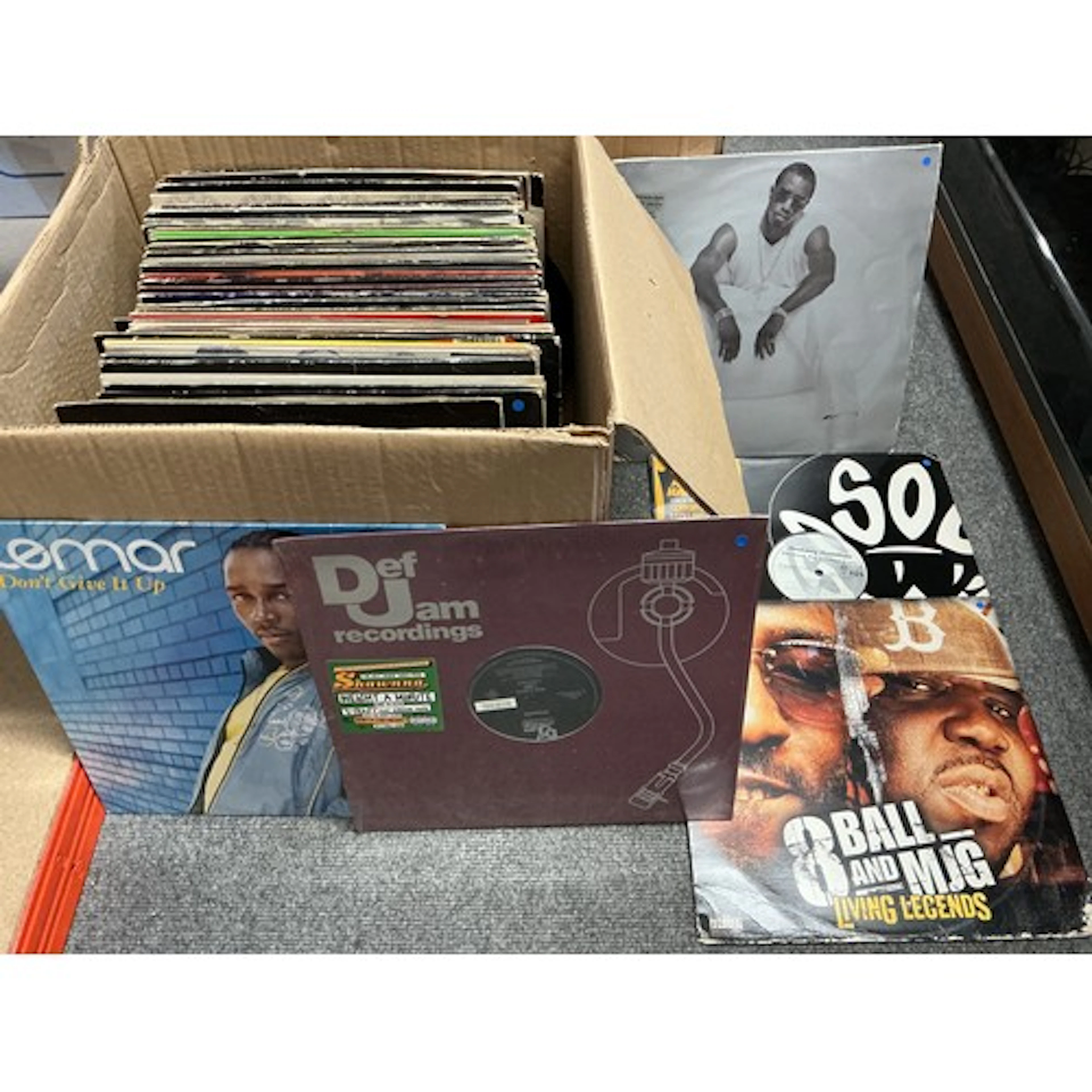 A box of hip hop, house and RnB LPs and 12” singles includin...