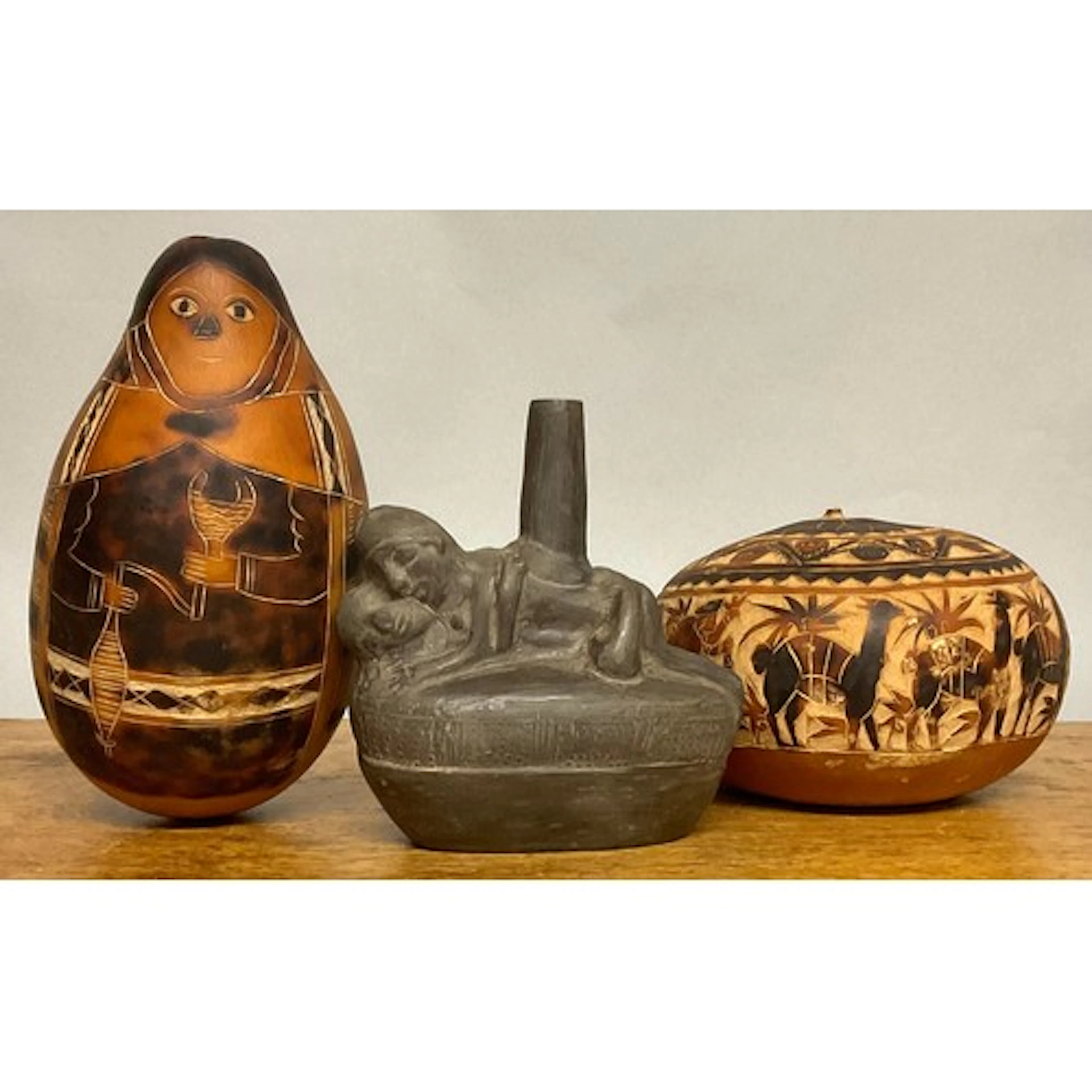 Folk Art - a South American gourd, carved and burned with a ...
