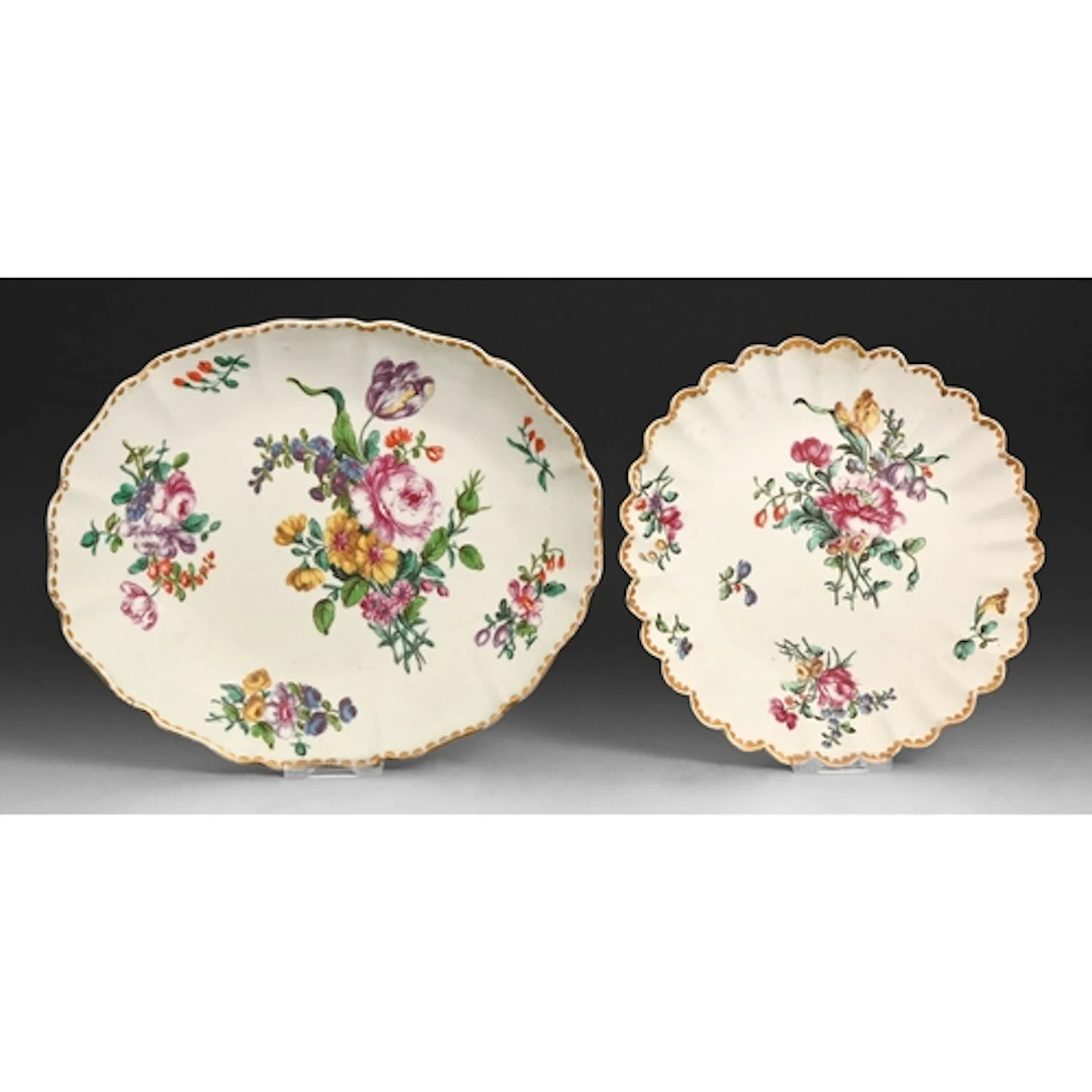 A Bow dish and scalloped plate, c1760-1770, painted with a l...