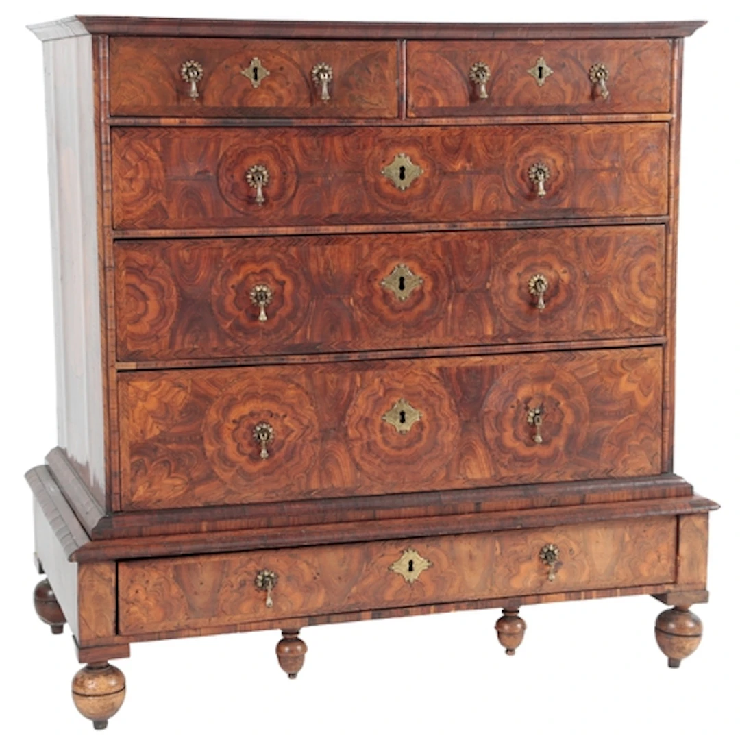 A William & Mary oyster kingwood and rosewood chest on low s...