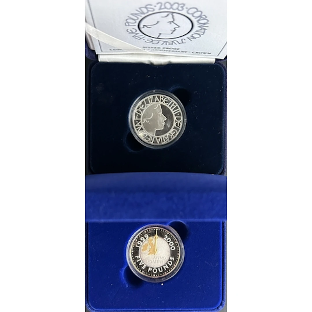 A group of seven UK QEII boxed silver proof Crowns, comprisi...