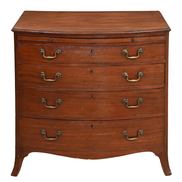 A George III bow fronted mahogany chest of drawers, with bru...