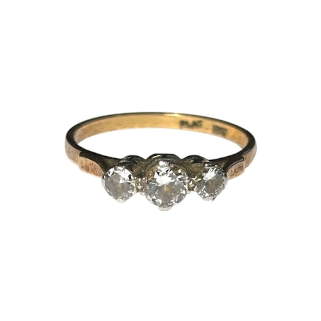 A diamond three-stone ring, claw-set with three brilliant-cu...