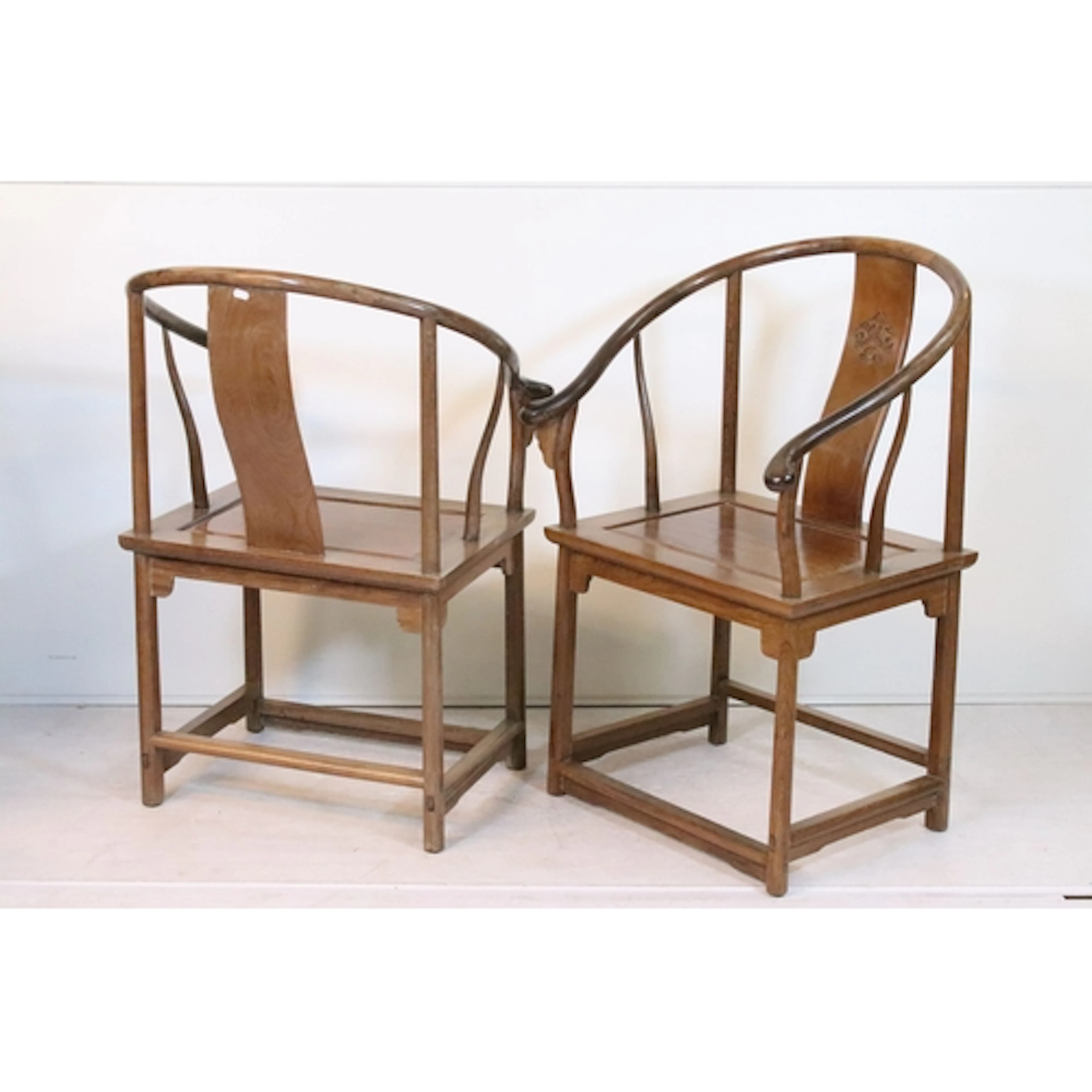Pair of 20th century Chinese huanghuali horseshoe backed arm...