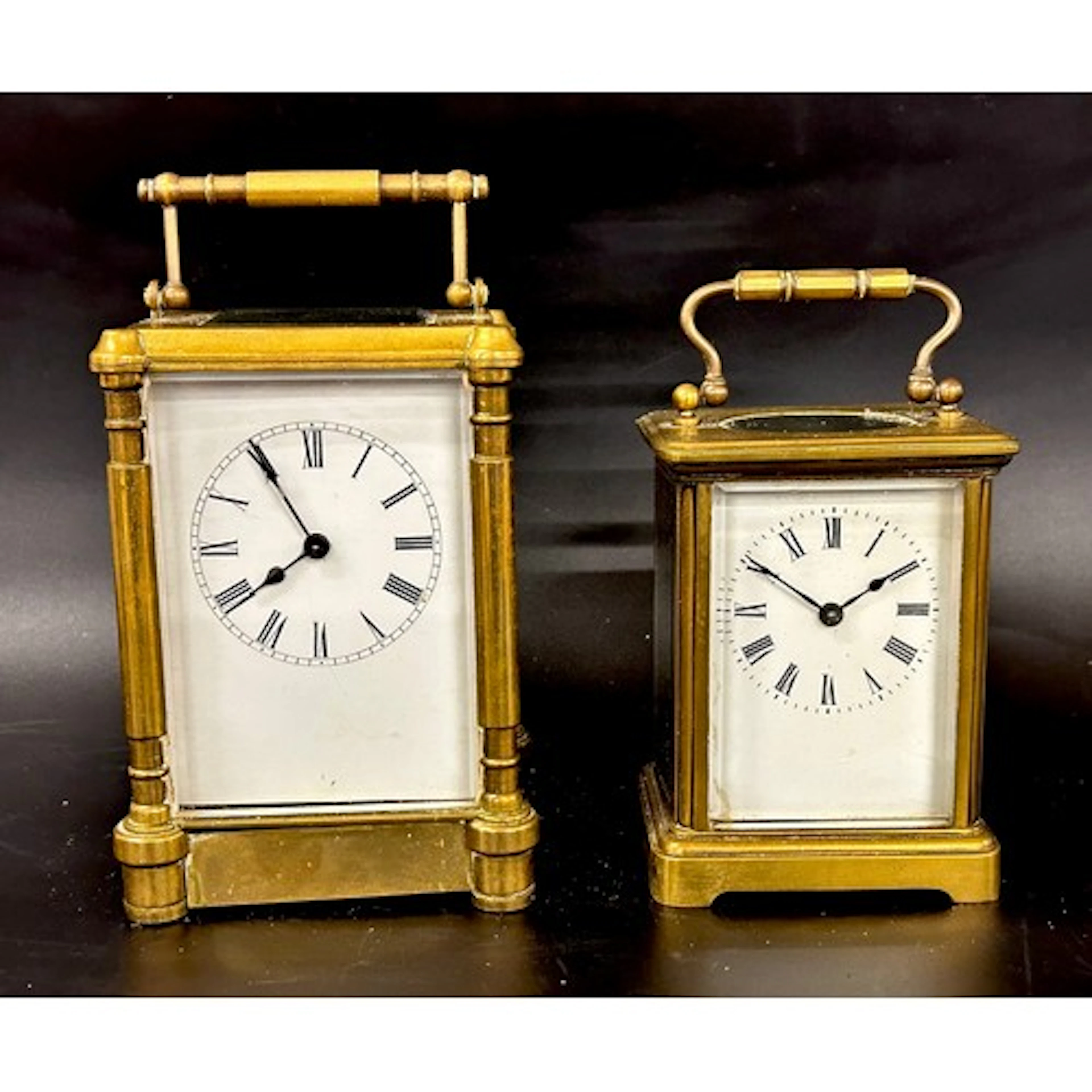 Two brass carriage clocks, both with keys, 14cm h