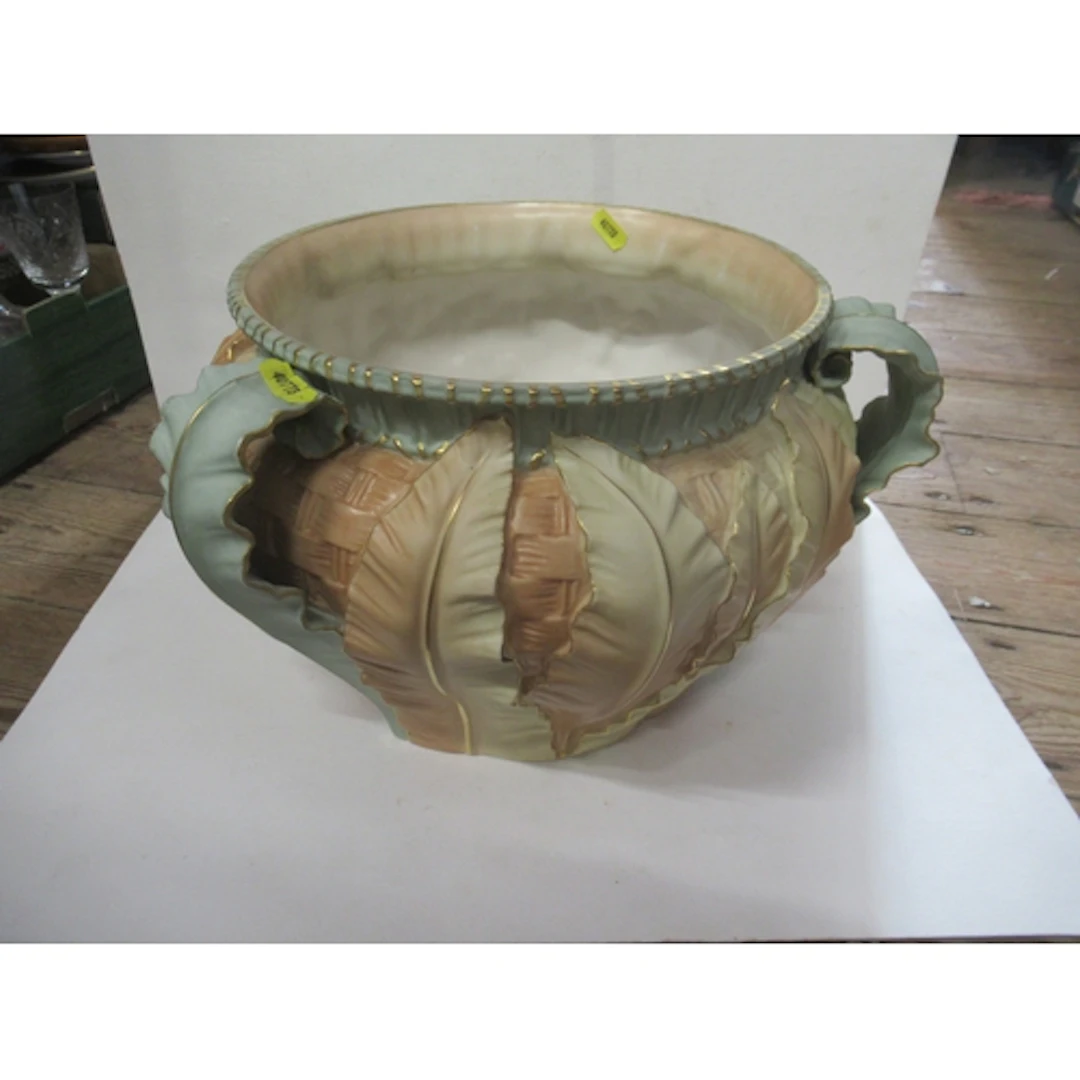 A Royal Worcester blush ivory jardiniere, with leaf moulded ...