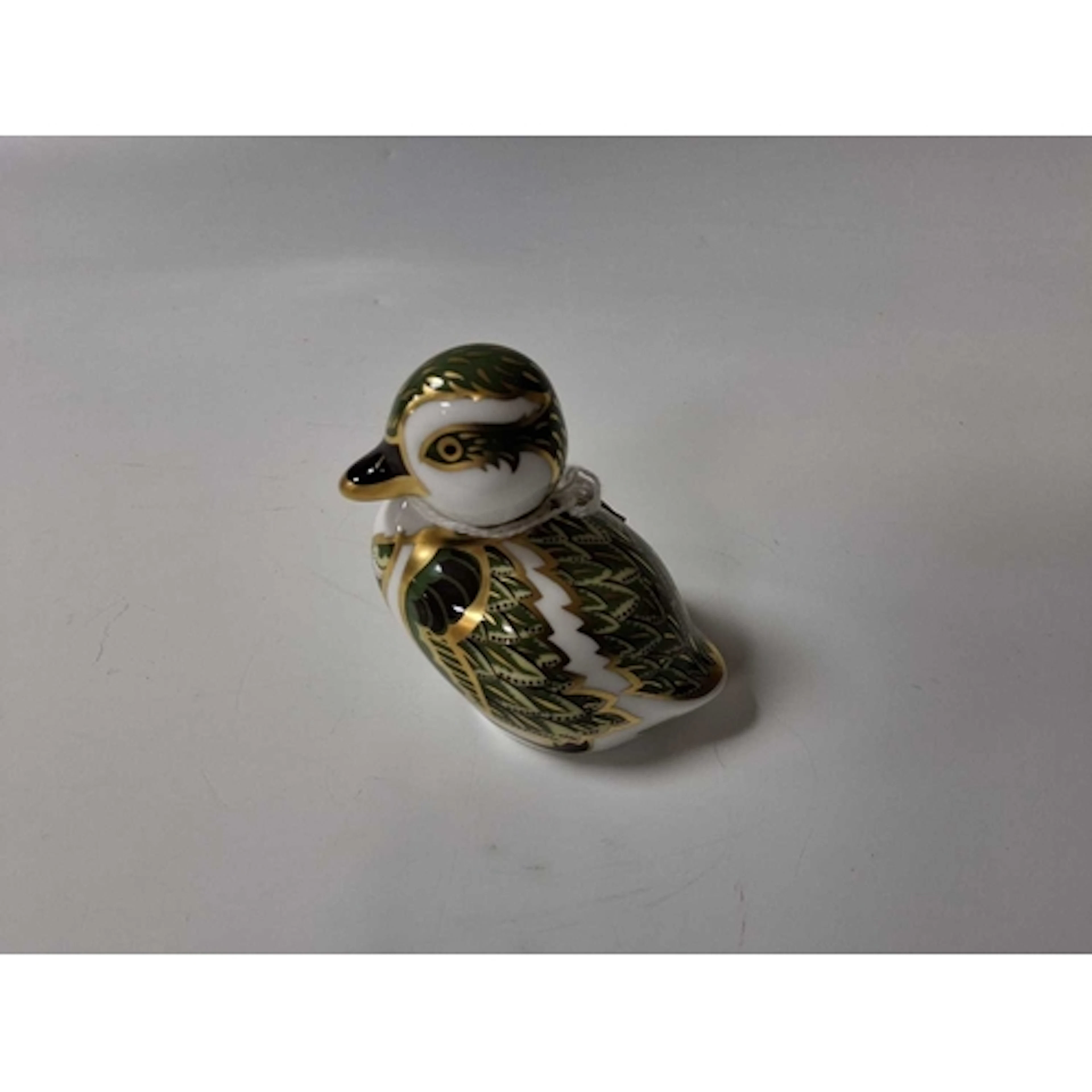 A ROYAL CROWN DERBY 'DERBYSHIRE DUCKLING' PAPERWEIGHT, exper...