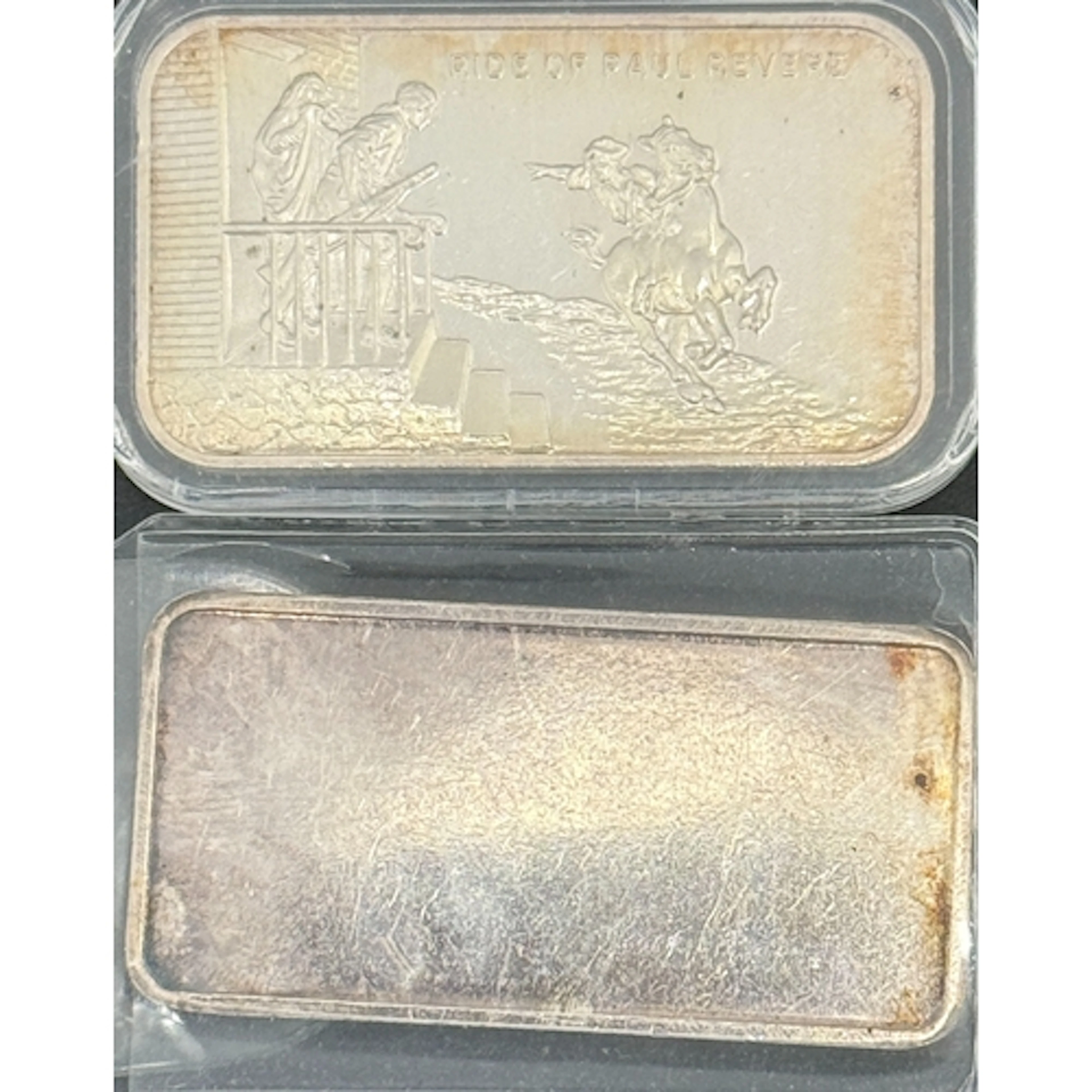 A pair of 1oz .999 fine silver ingots, comprising a United S...