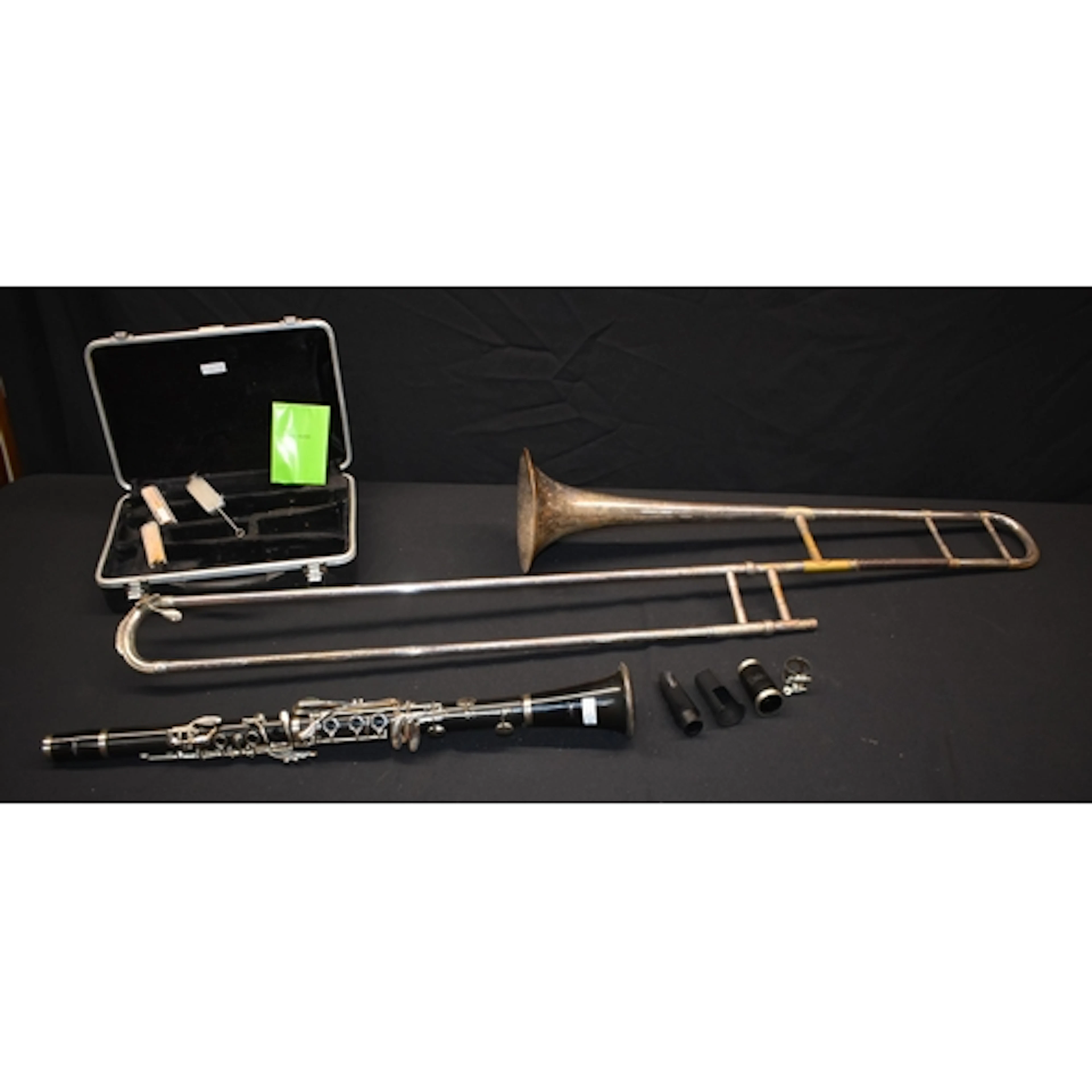 A cased freedom clarinet together with a vintage Boosey & Ha...
