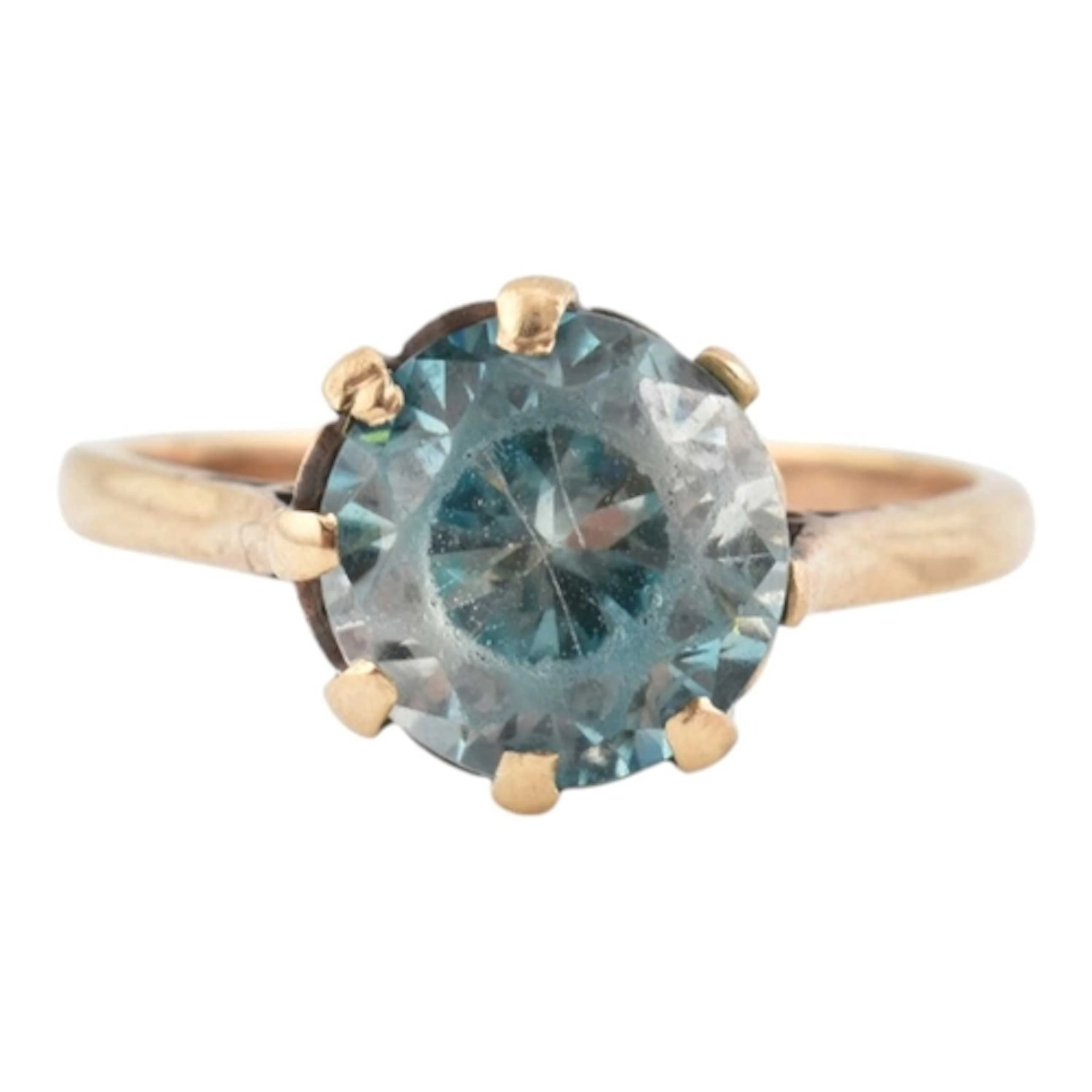 A 9ct gold and blue zircon ring. The ring is set with a sing...