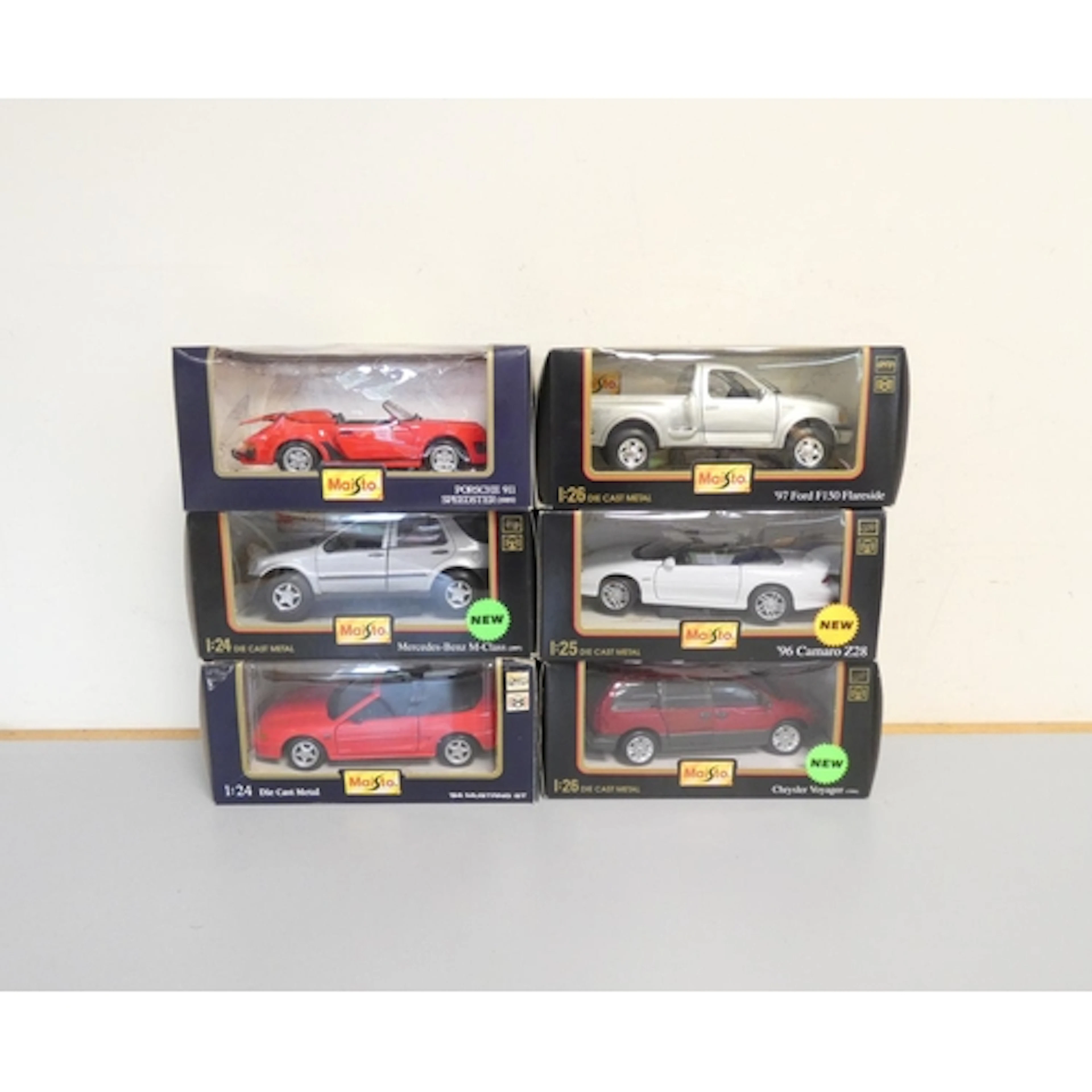 Maisto. Six boxed die-cast vehicles to include three 1:24 sc...