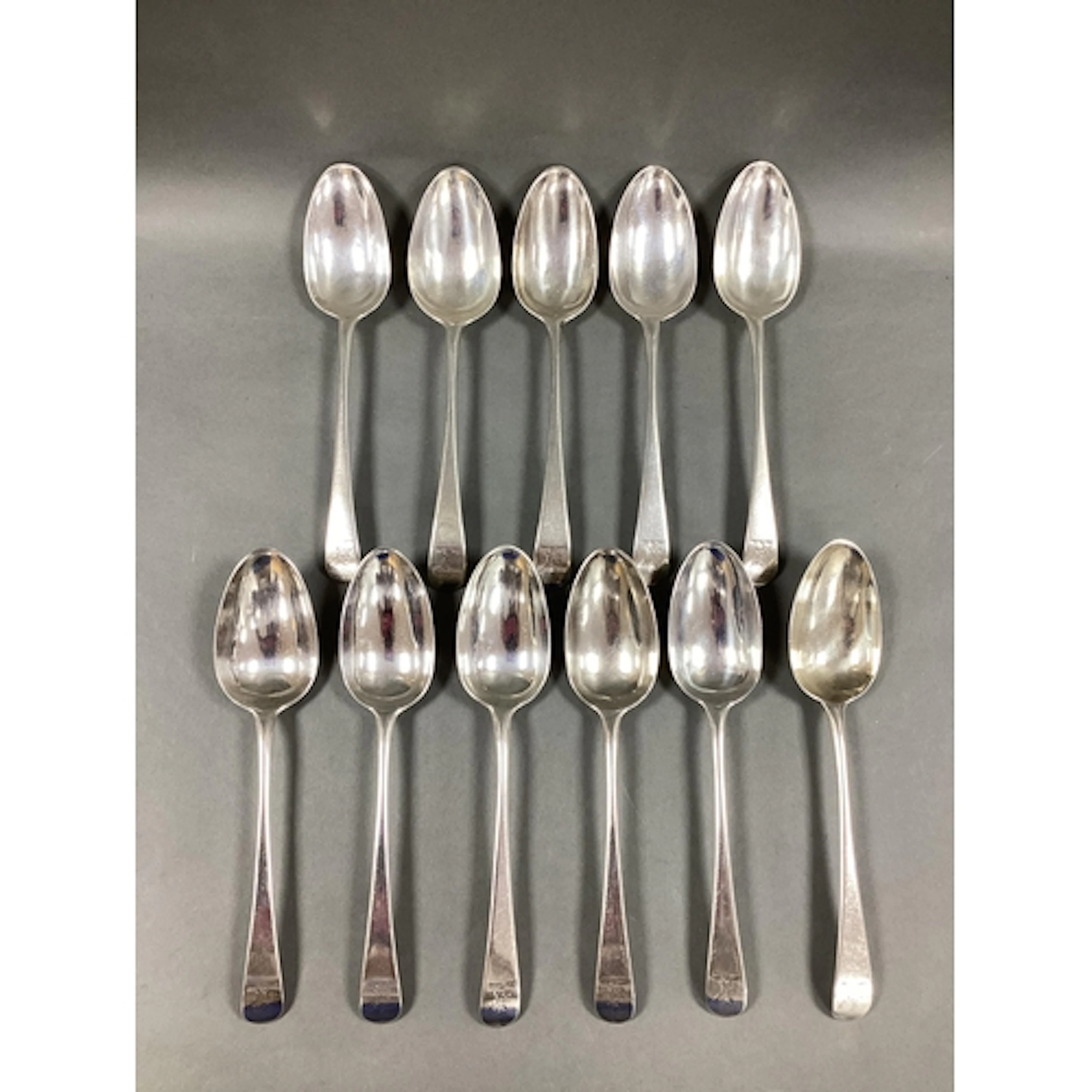 A Matched Set of Eleven Georgian Bottom Struck Hallmarked Si...