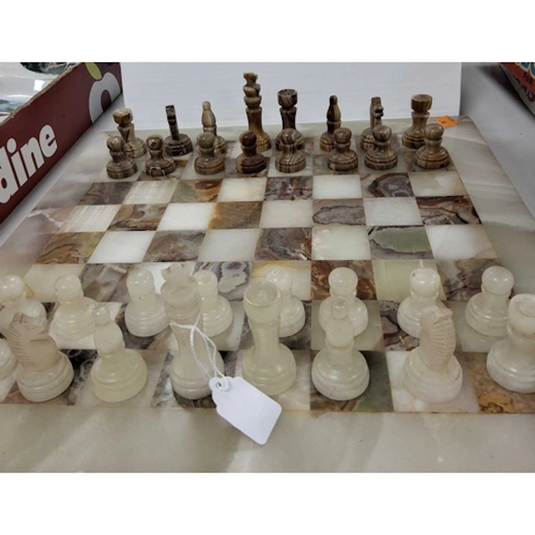 A ONYX MEXICAN FOLK ART STYLE CHESS SET WITH POLISHED STONE ...