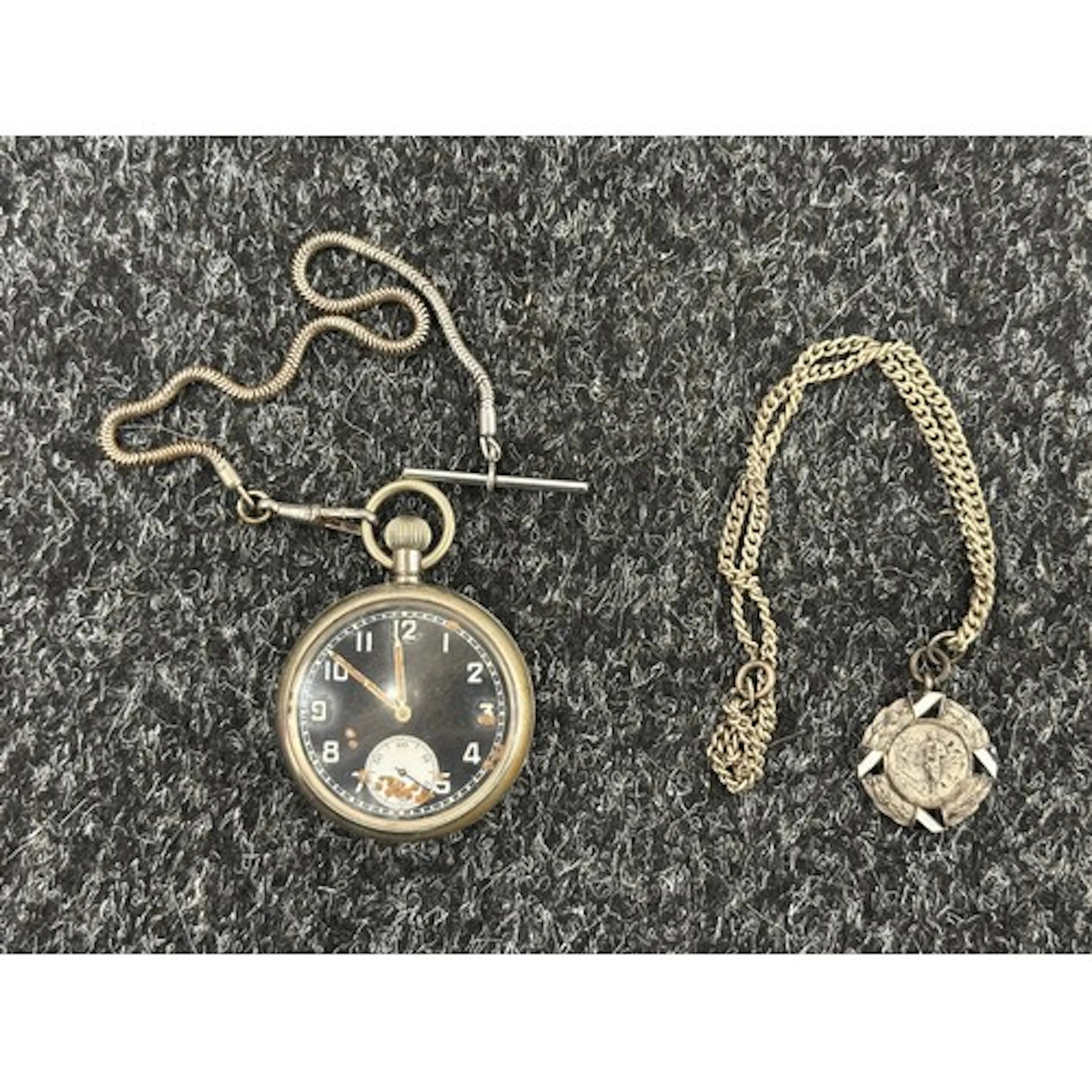 WW2 British GSTP pocket watch with black dial with Arabic nu...