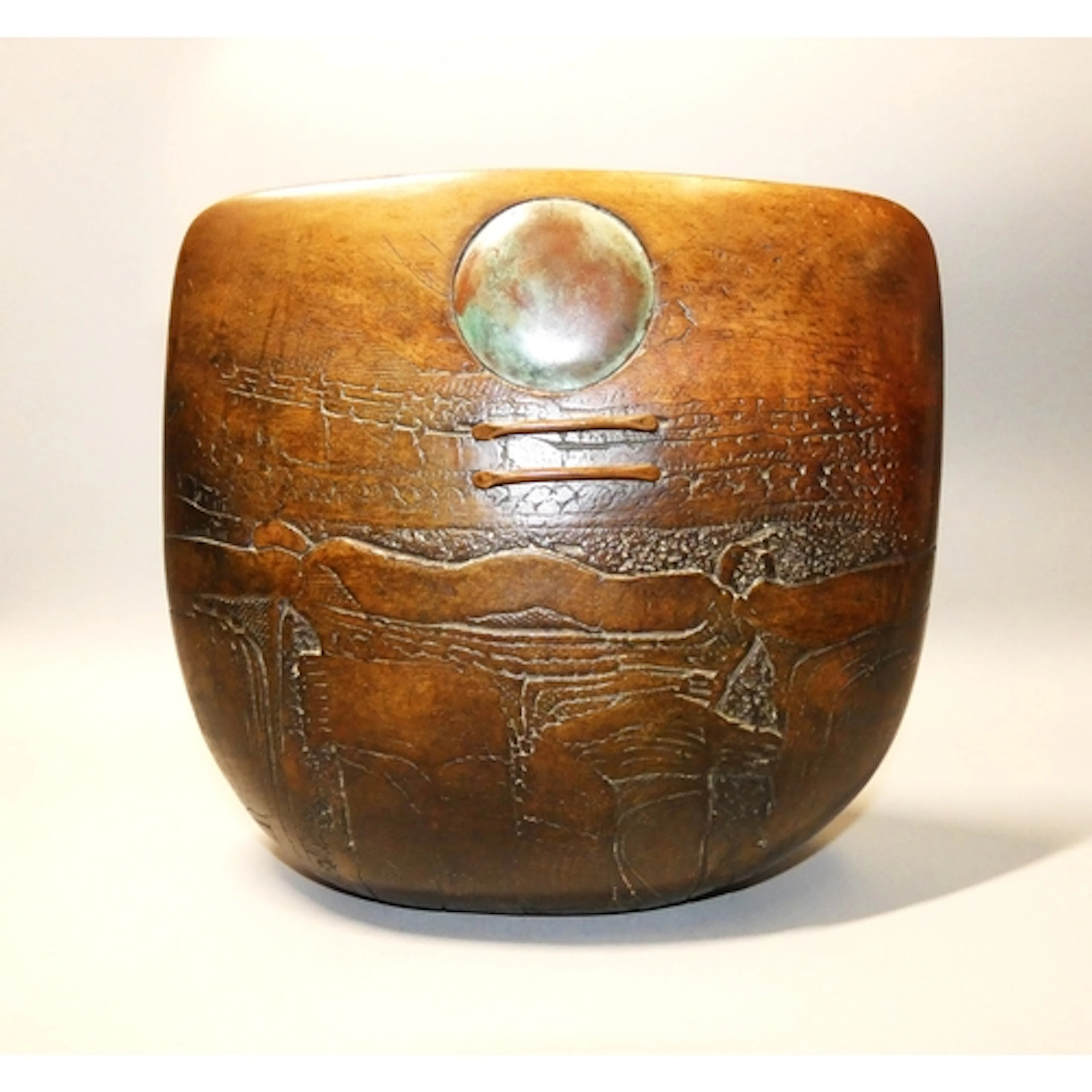 PETER HAYES, BRITISH B.1946, A Raku fired ceramic bow form s...