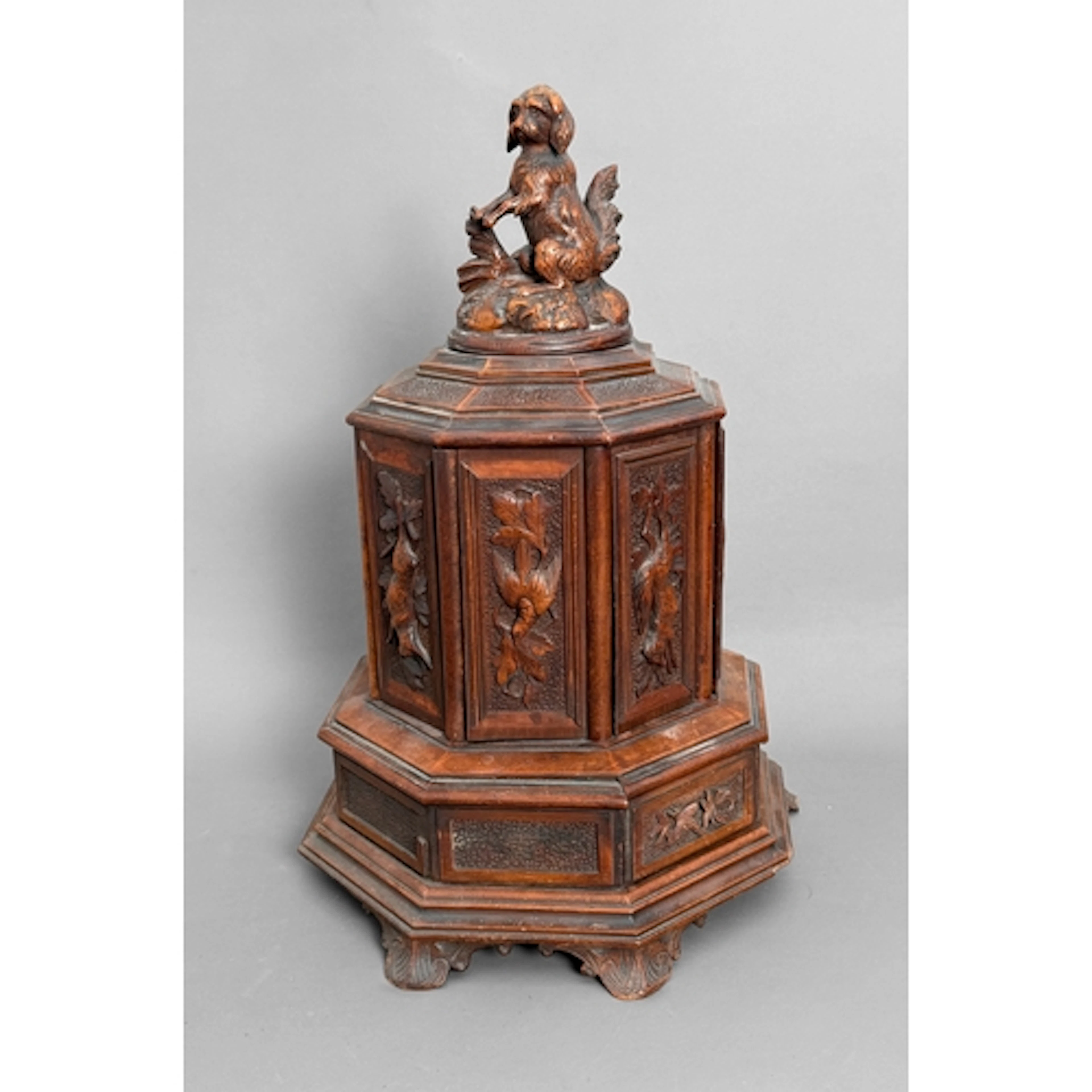 A nineteenth century Black Forest carved walnut humidor - of...