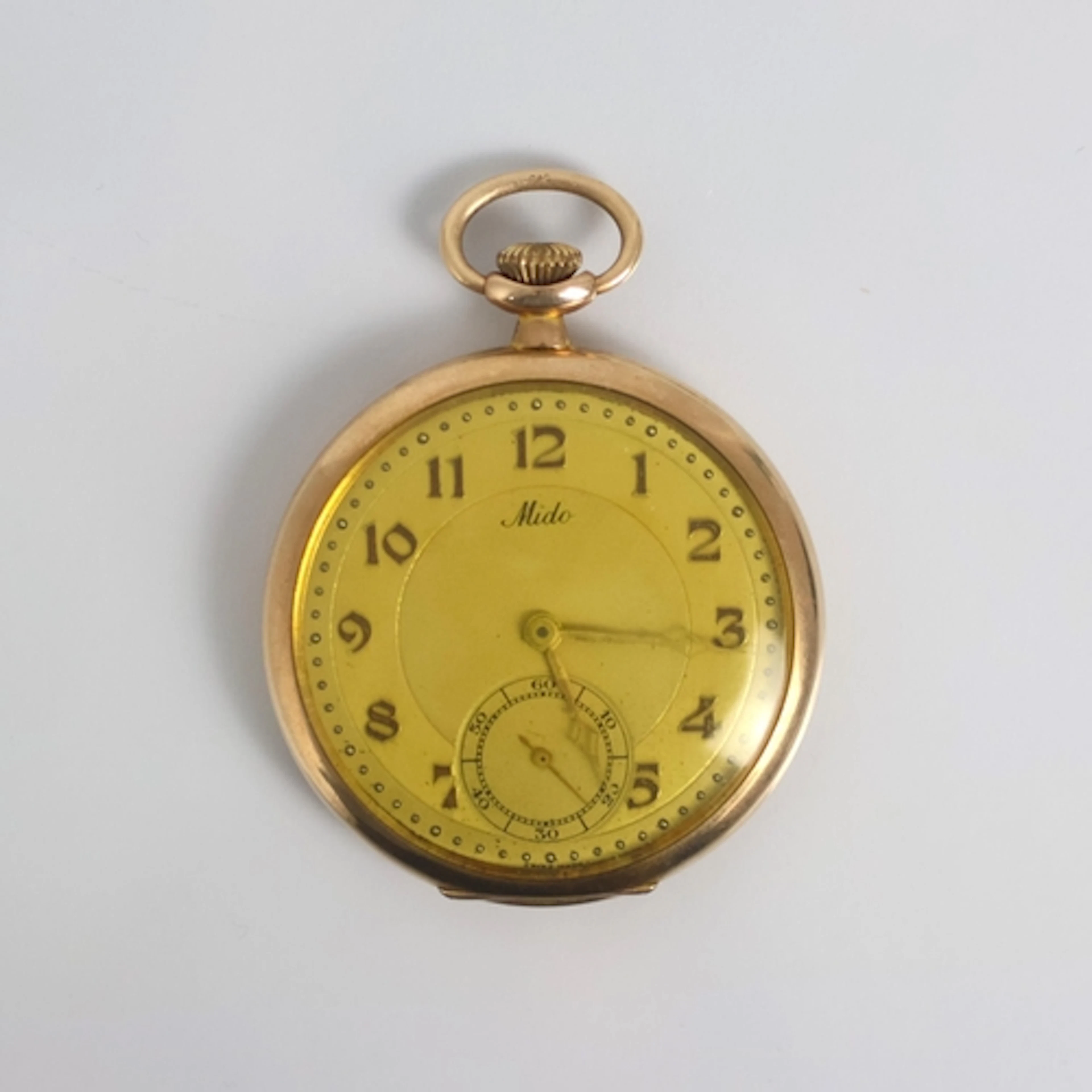 An early 20th century 9ct gold cased Mido open faced pocket ...