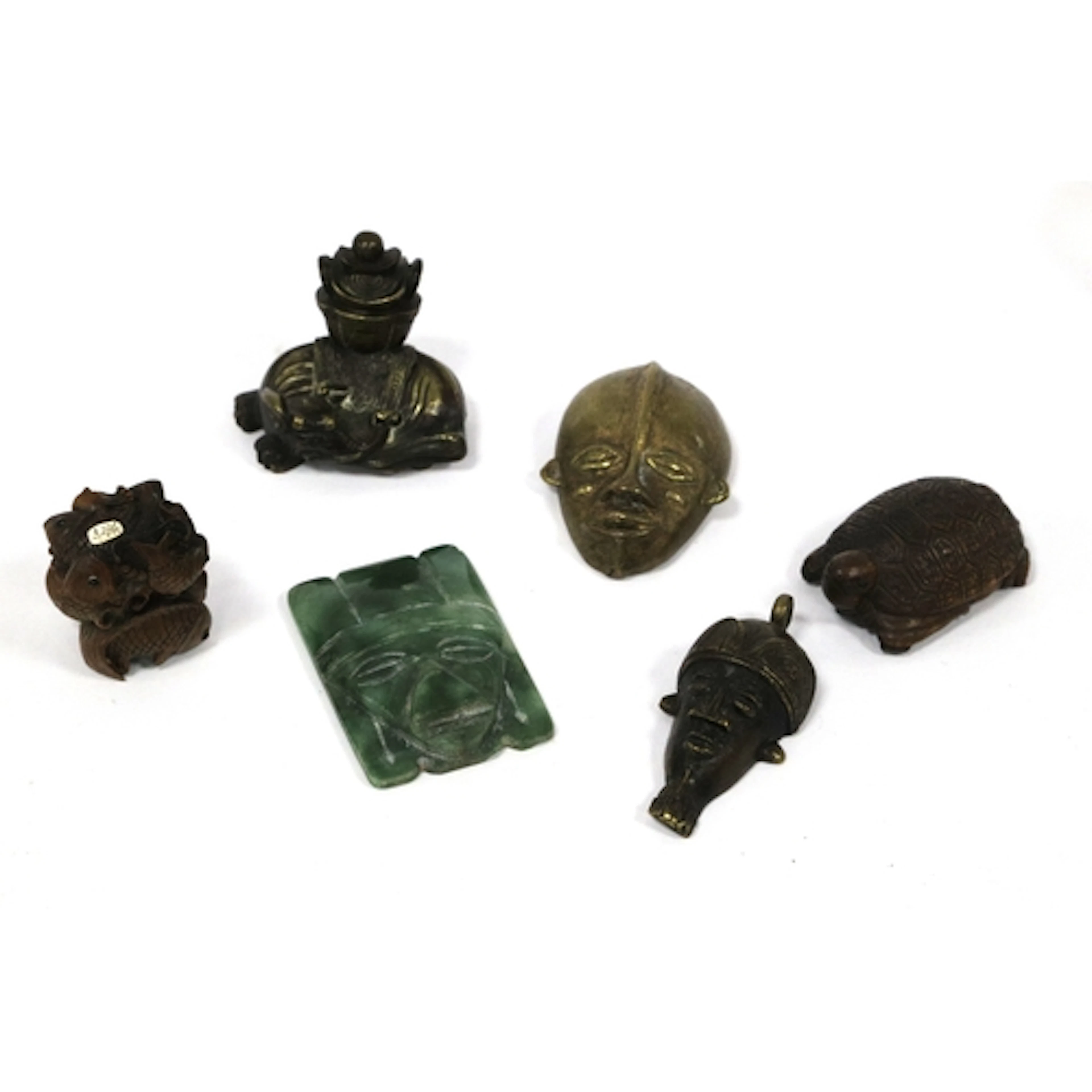 A Jadeite Carving of a Head in the South American Style, 6cm...