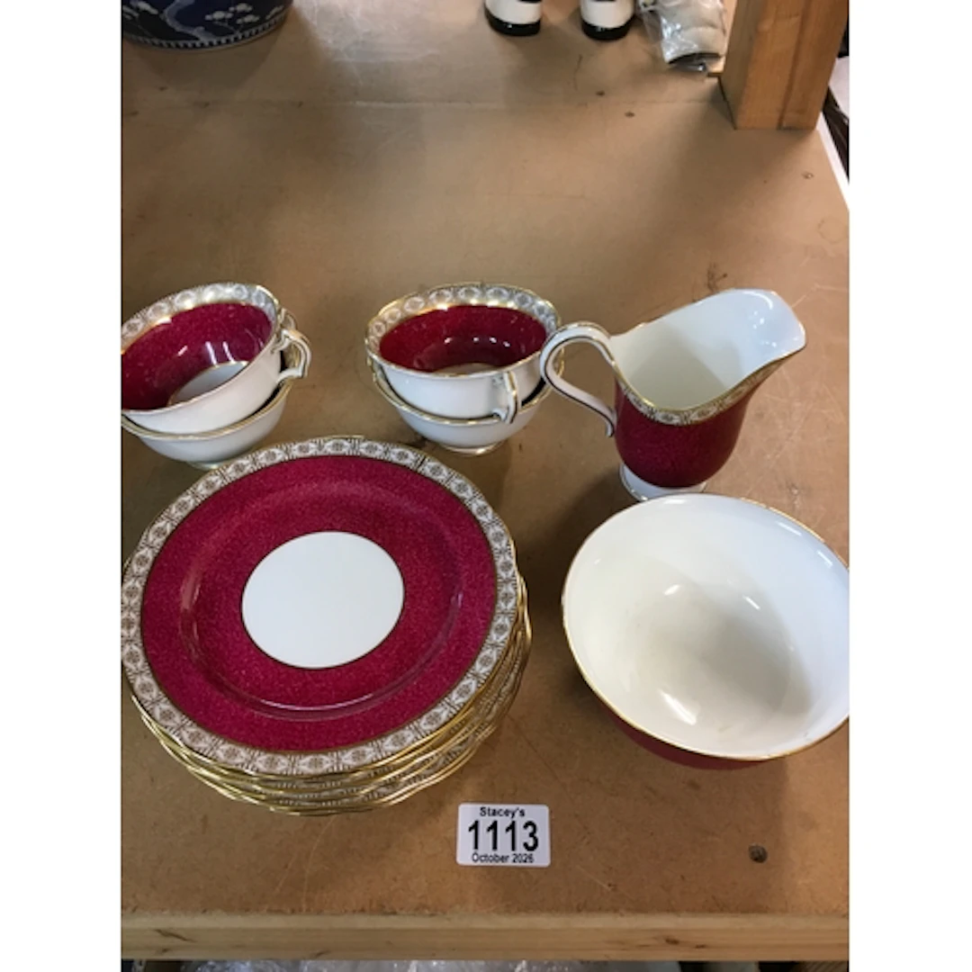A small collection of George Jones red glazed tableware ...