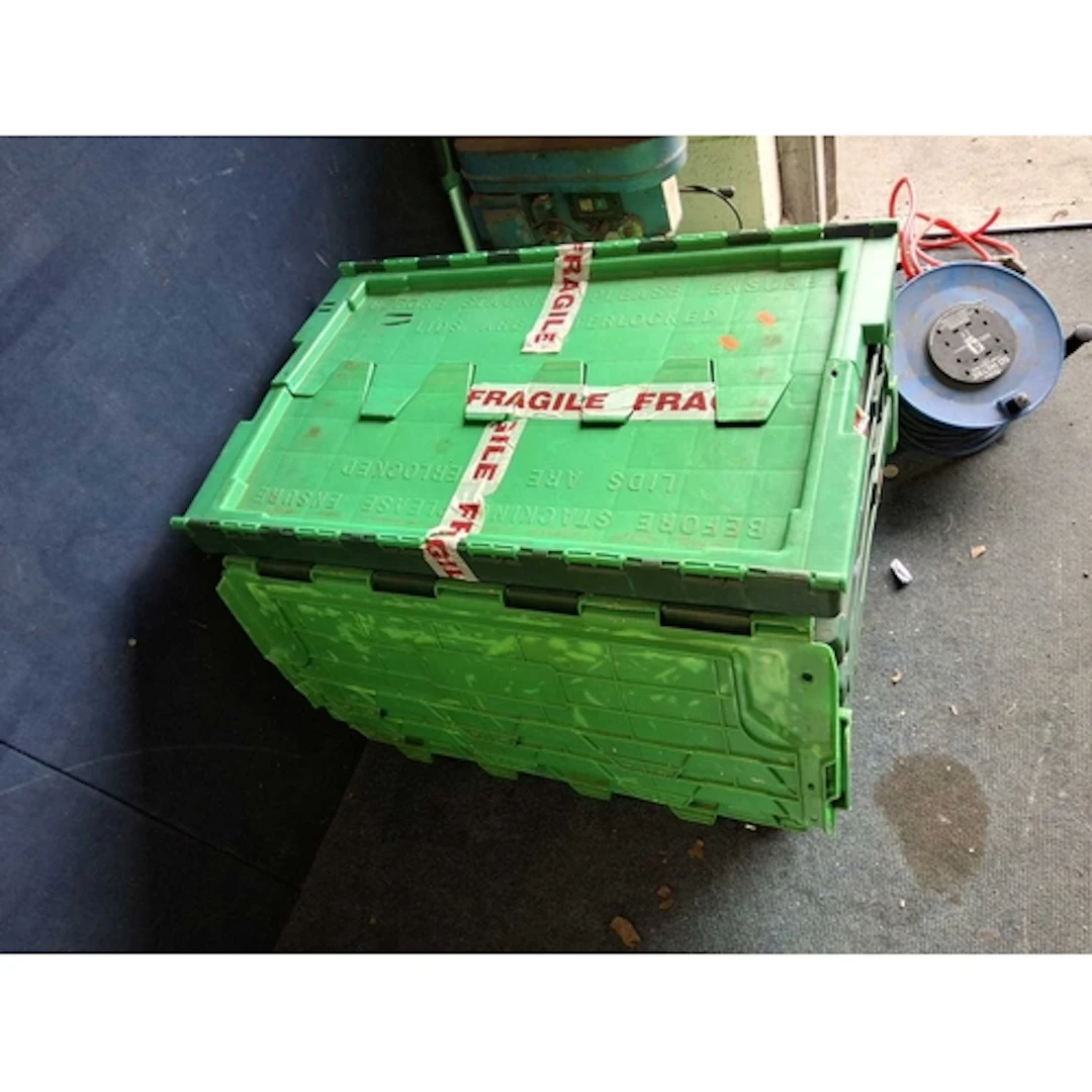 FOUR PLASTIC TOTE BOXES with lids 72cm long