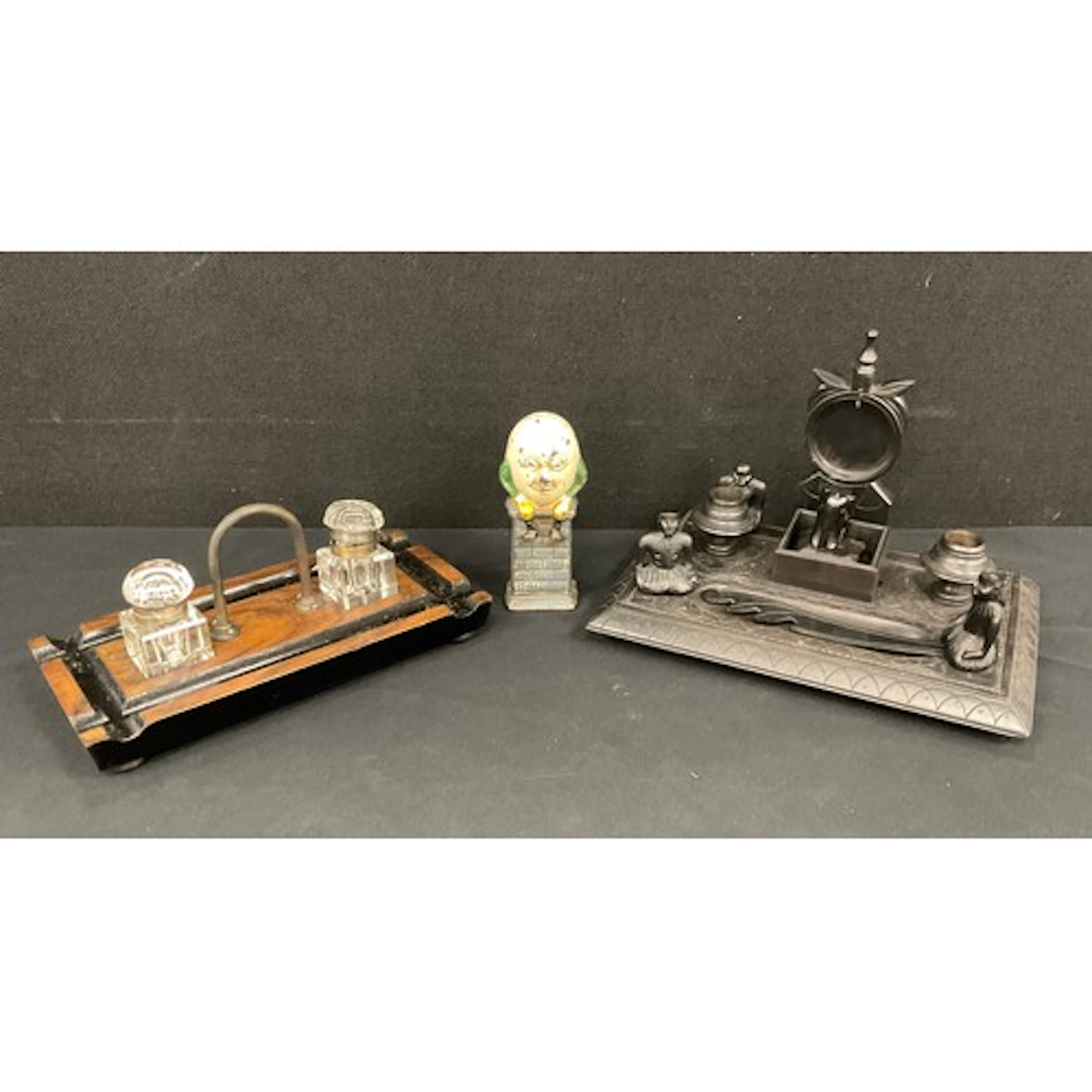 A late 19th century Indian carved ebony standish desk stand,...