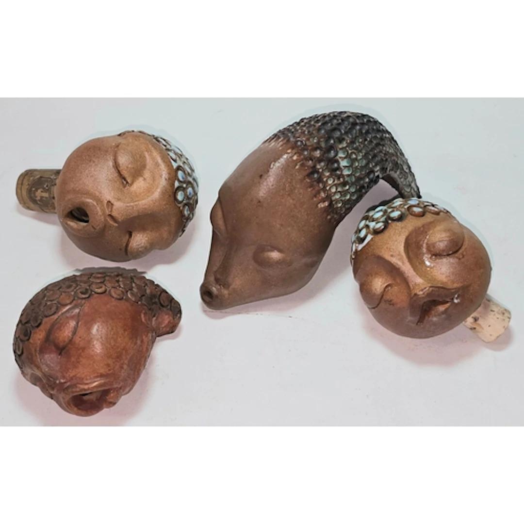 Poole Pottery interest Guy Sydenham heads (bottle tops) all ...