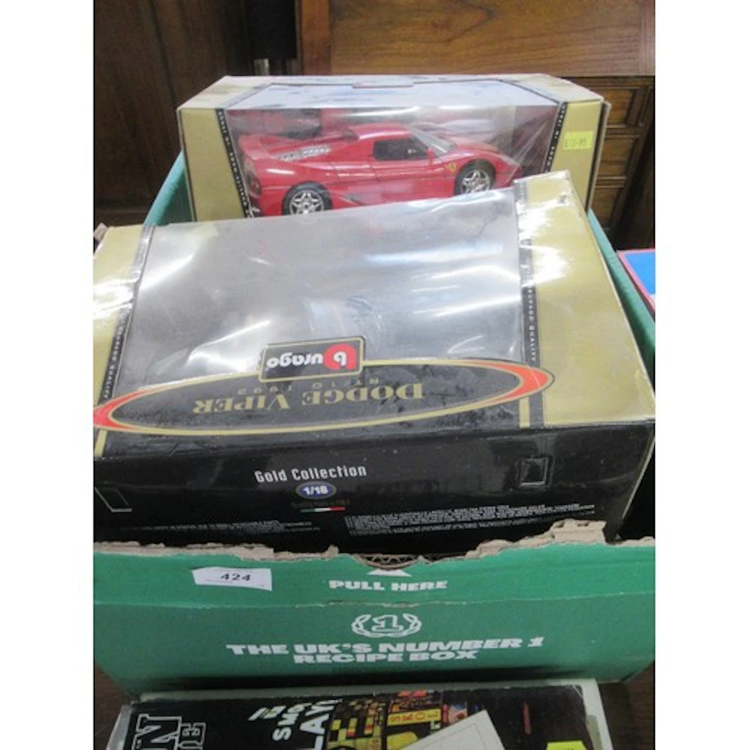 A box of model cars to include Burago examples