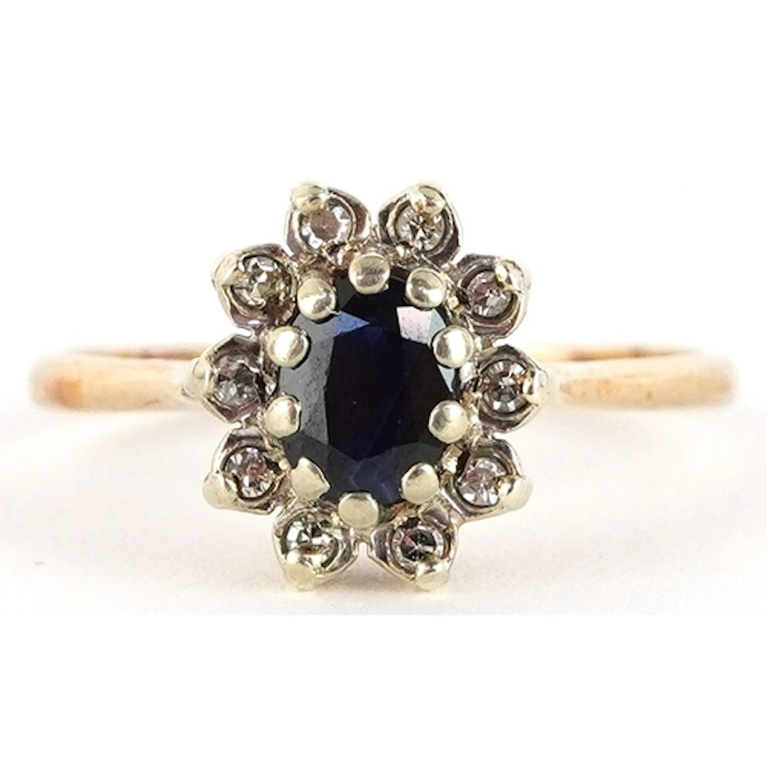 9ct gold diamond and sapphire cluster ring, size O/P, 2.5g.