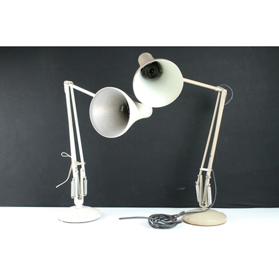 Two Herbert Terry anglepoise lamps, one in khaki colour, the...
