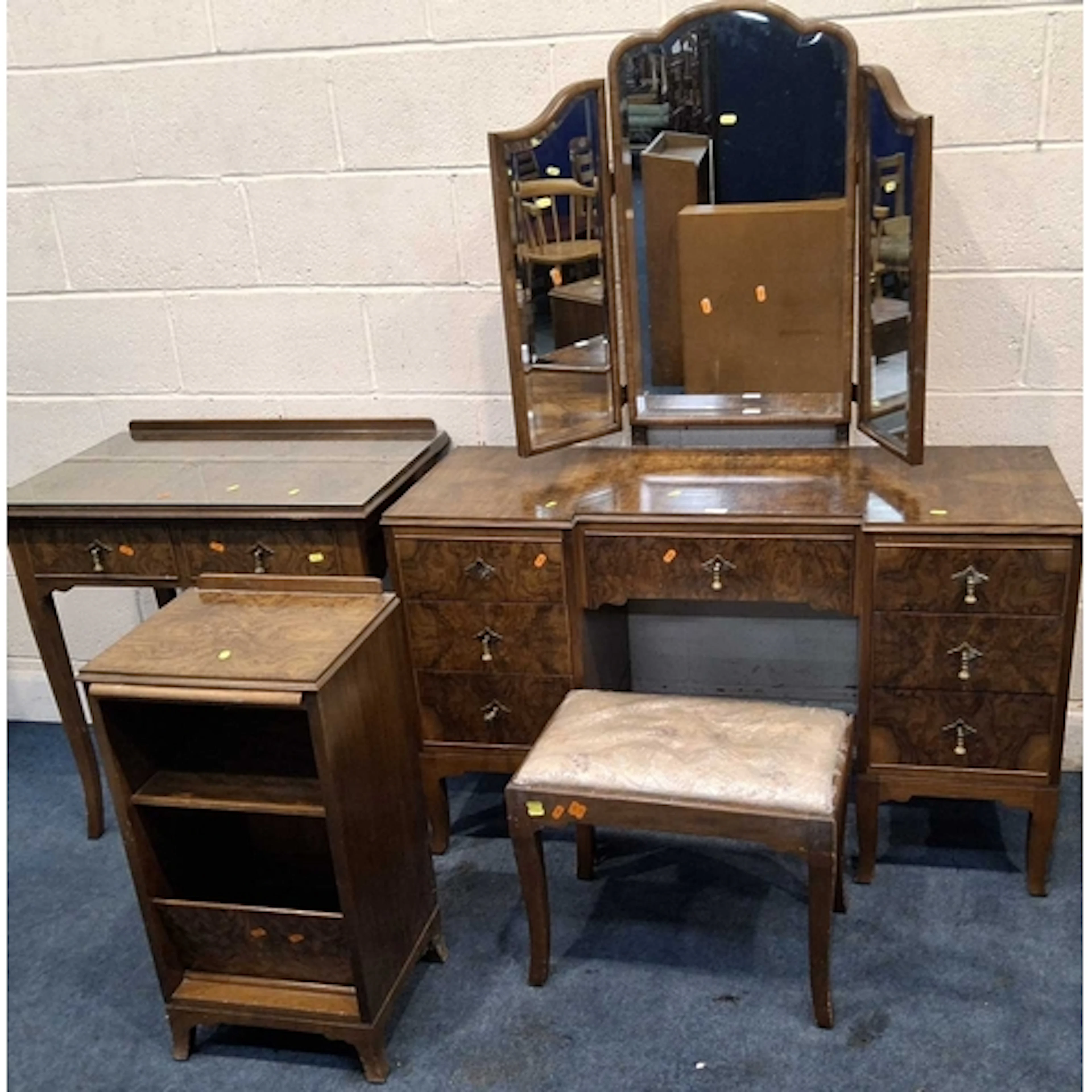 A REPRODUCTION BURR WALNUT BEDROOM SUITE, comprising a dress...