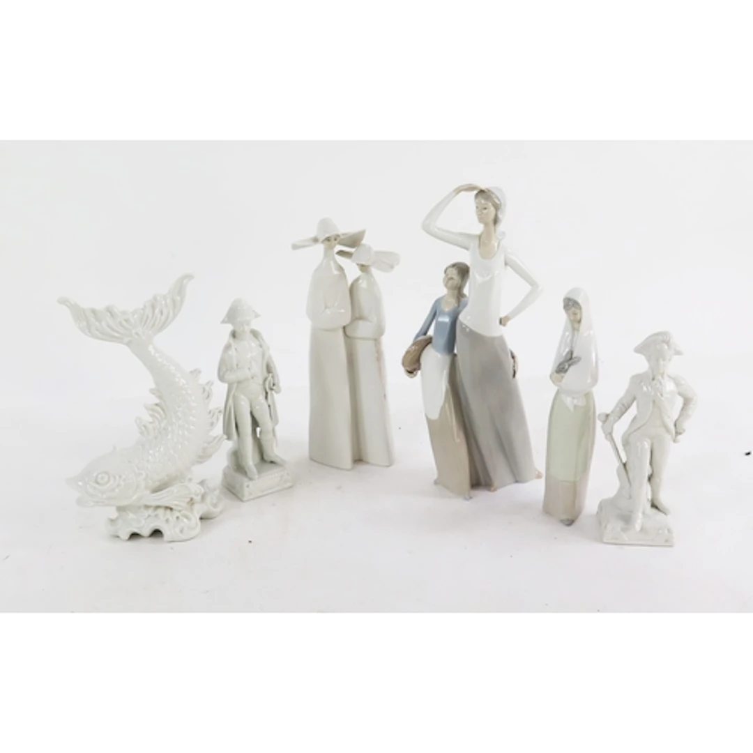 Lladro, Nao and others, a collection of figurines, including...