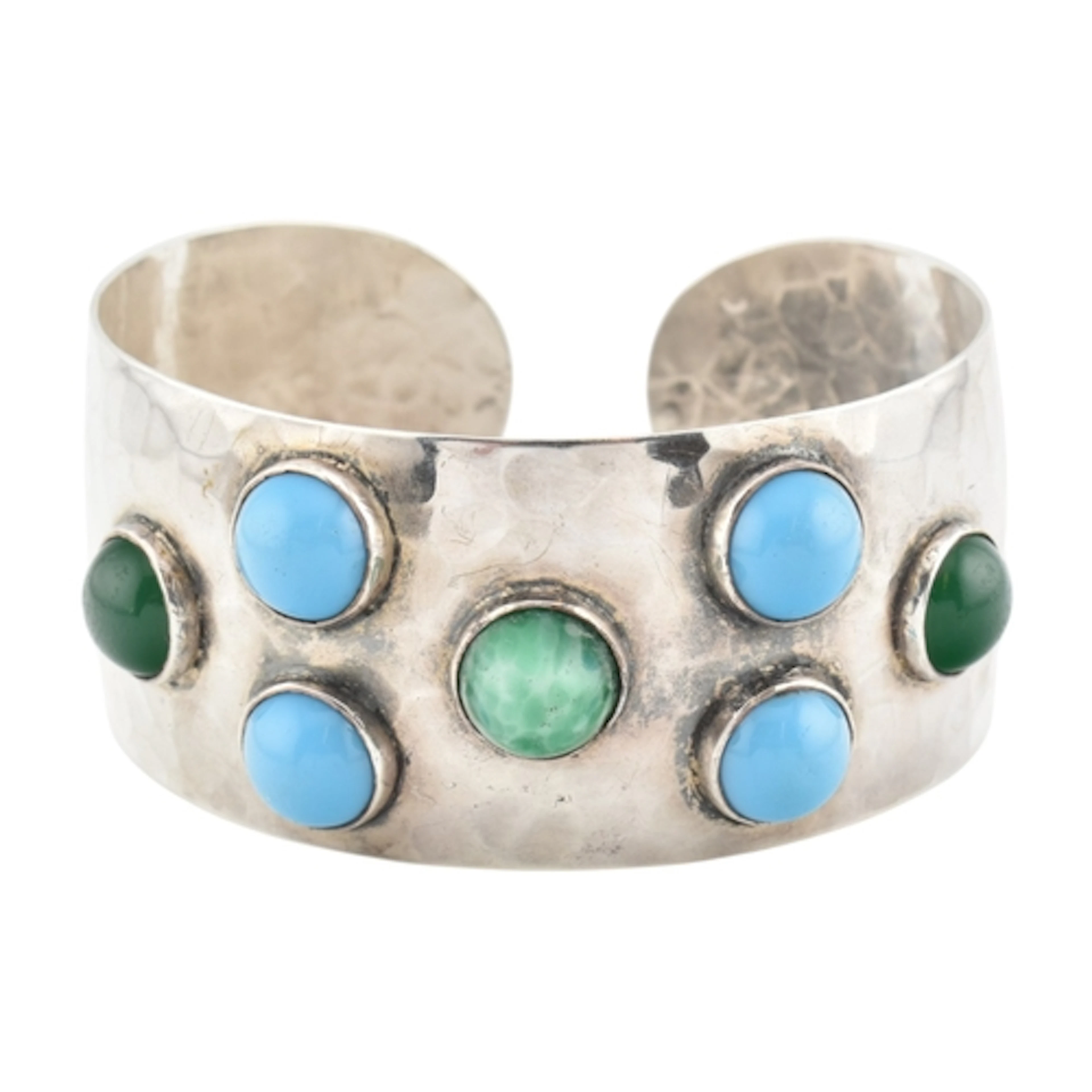 A continental silver gem set cuff bangle set with three gree...