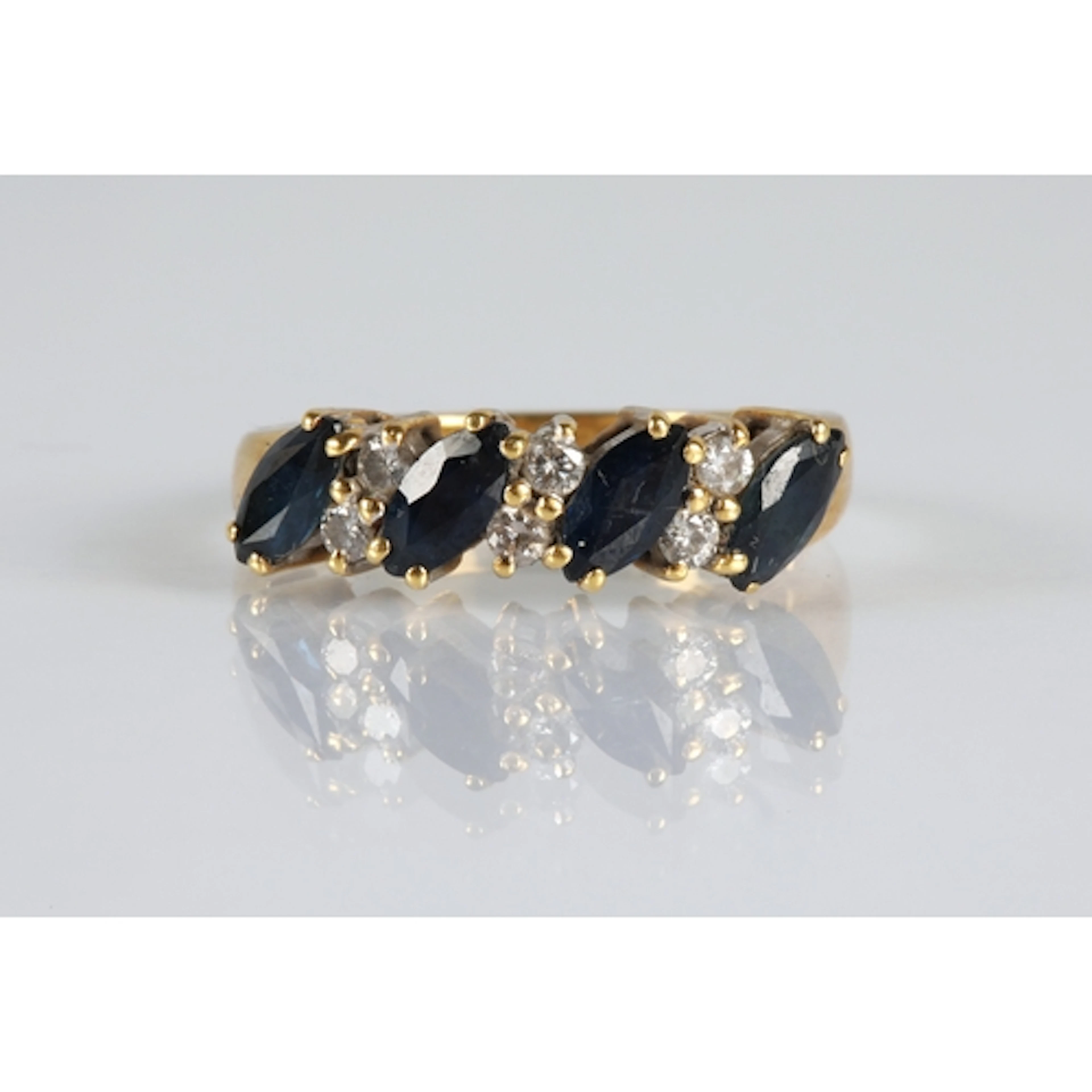 18ct gold sapphire and diamond ten stone ring, set with four...
