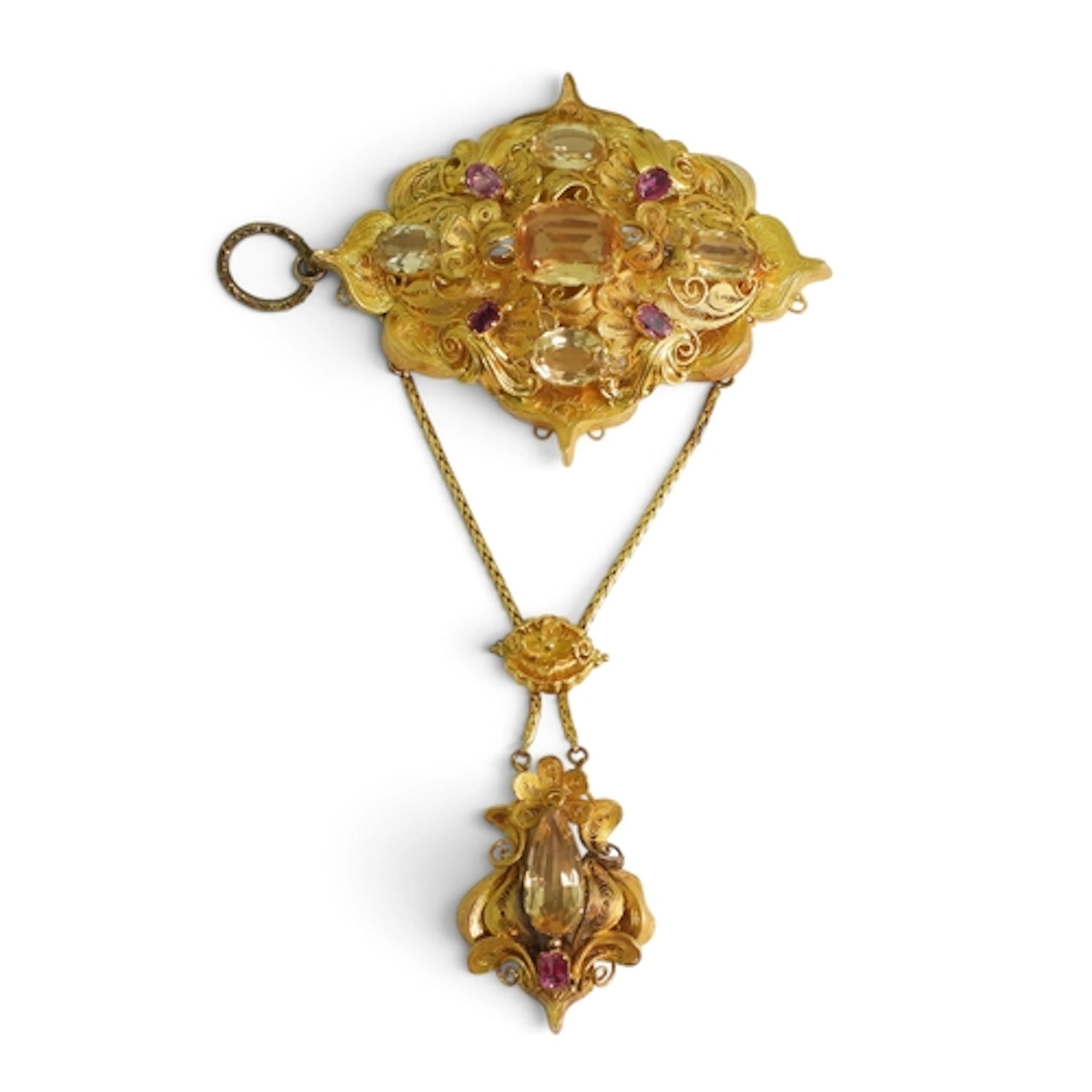 A VICTORIAN FILIGREE BROOCH set with pink sapphires and peac...