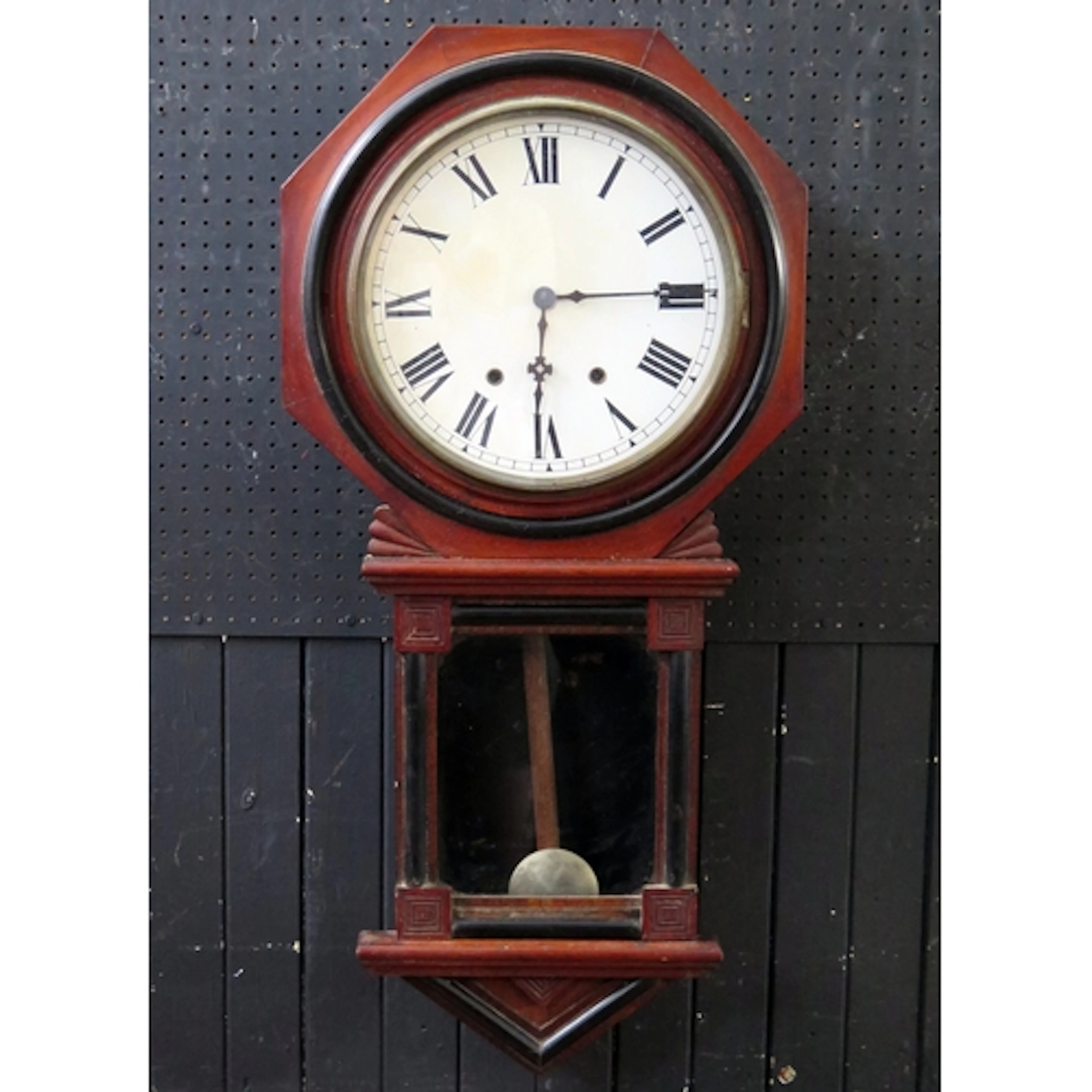 A late 19th century wall clock, with 31cm Roman dial, the tw...