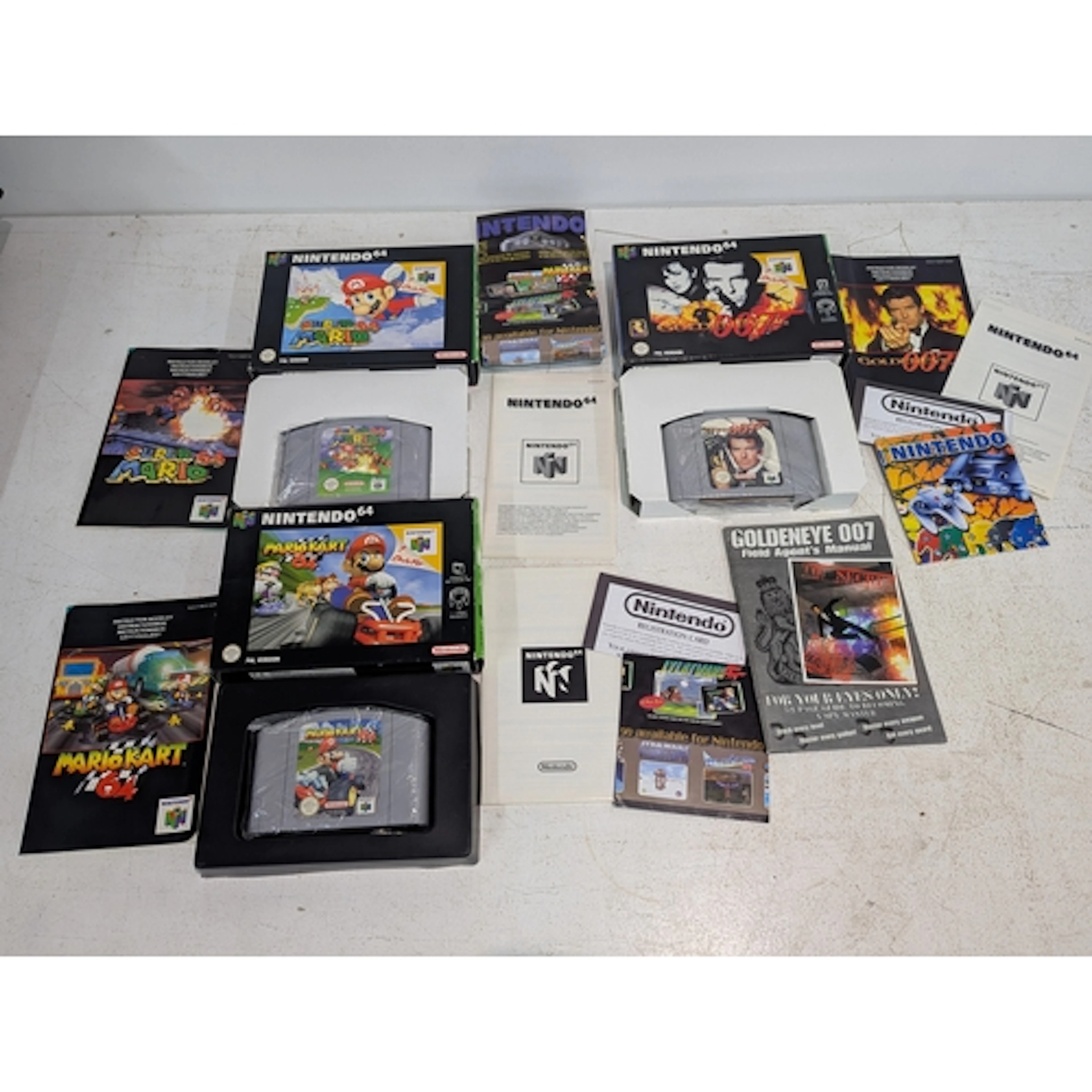 Three Nintendo 64 games to include Mario Kart, Super Mario a...