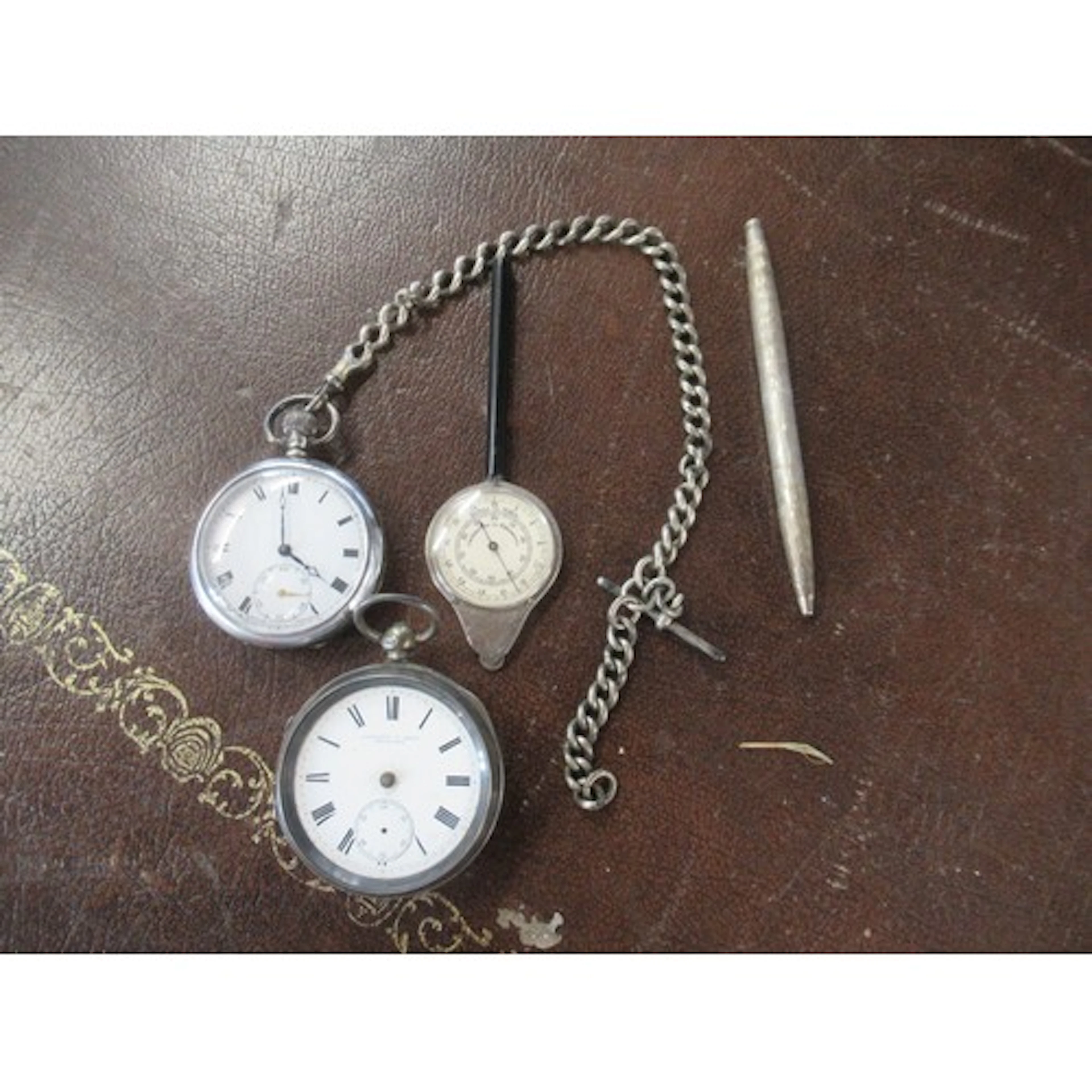 Two silver cased pocket watches, together with a silver prop...
