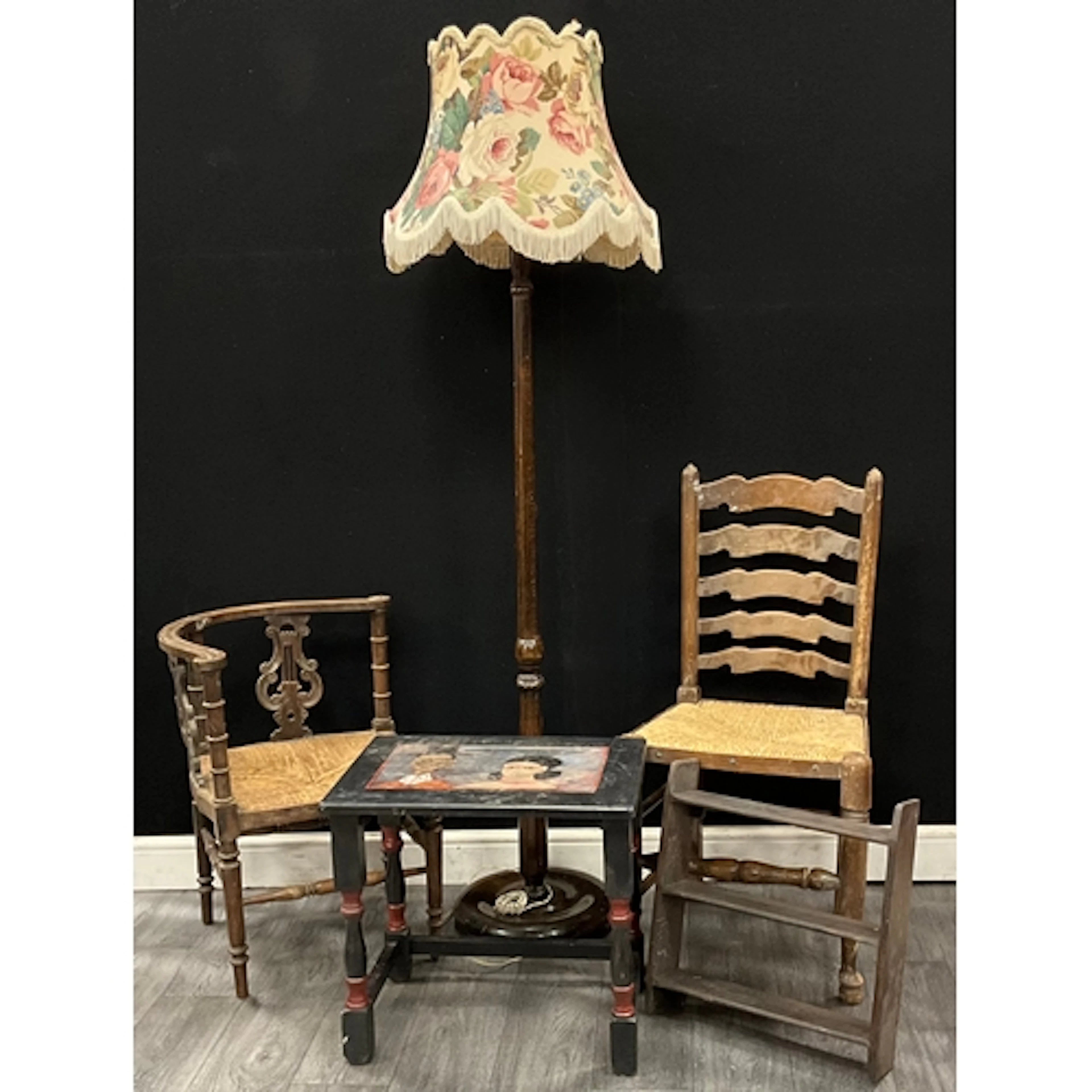 A ladder back rush chair, a Mahogany turned floor lamp stand...