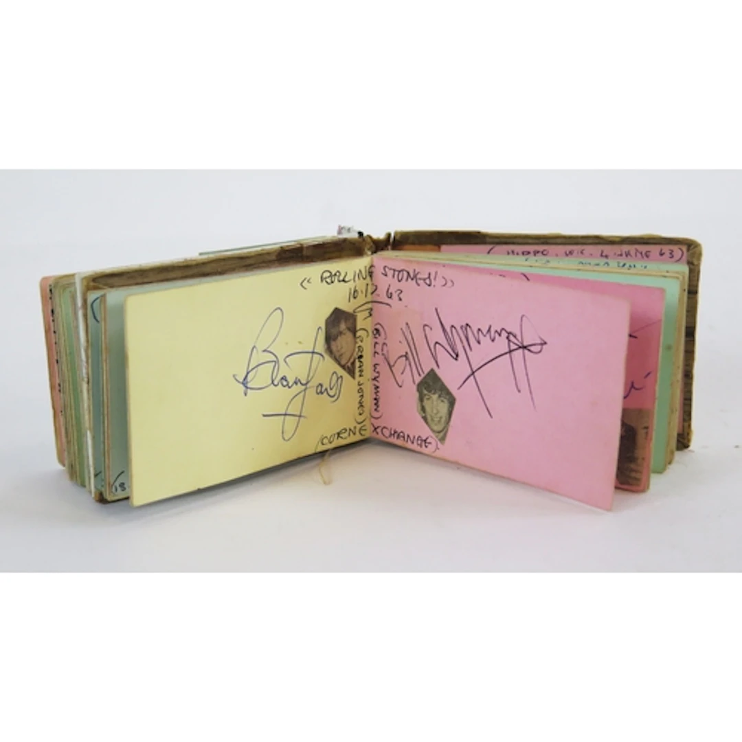 A 1960's autograph book containing numerous pop, theatre and...