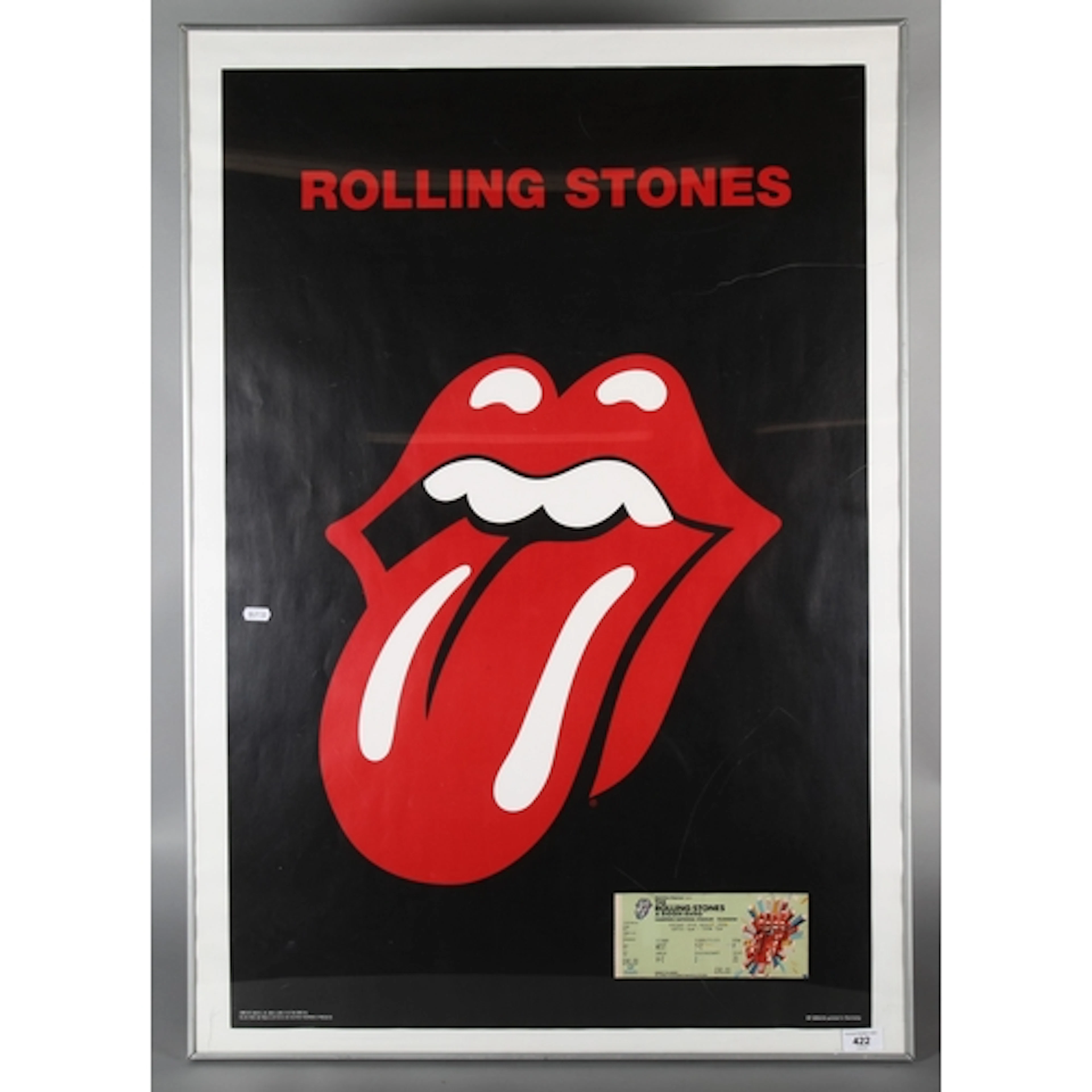Framed Rolling Stone poster and a Rolling Stone concer...