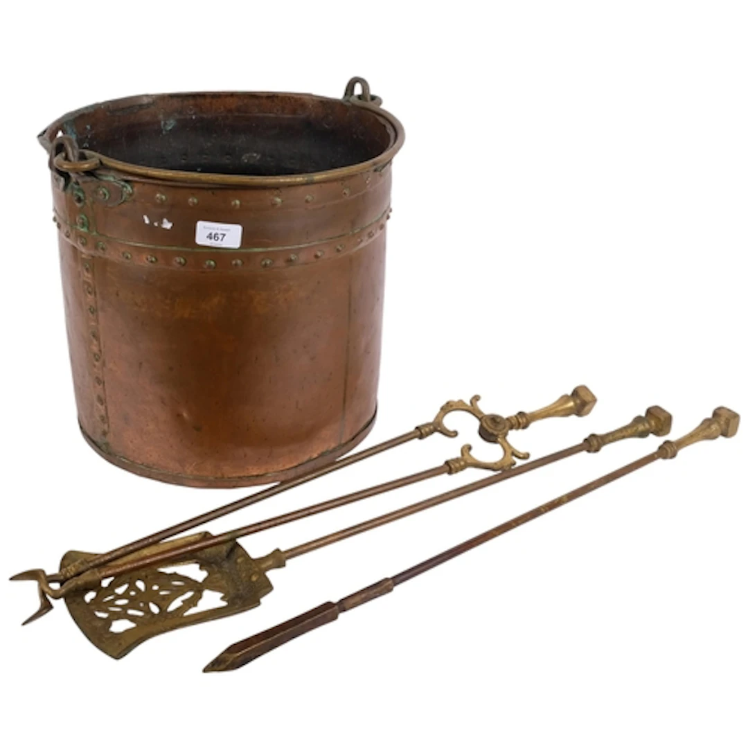 A copper coal bucket with swing handle, and a 3-piece brass ...