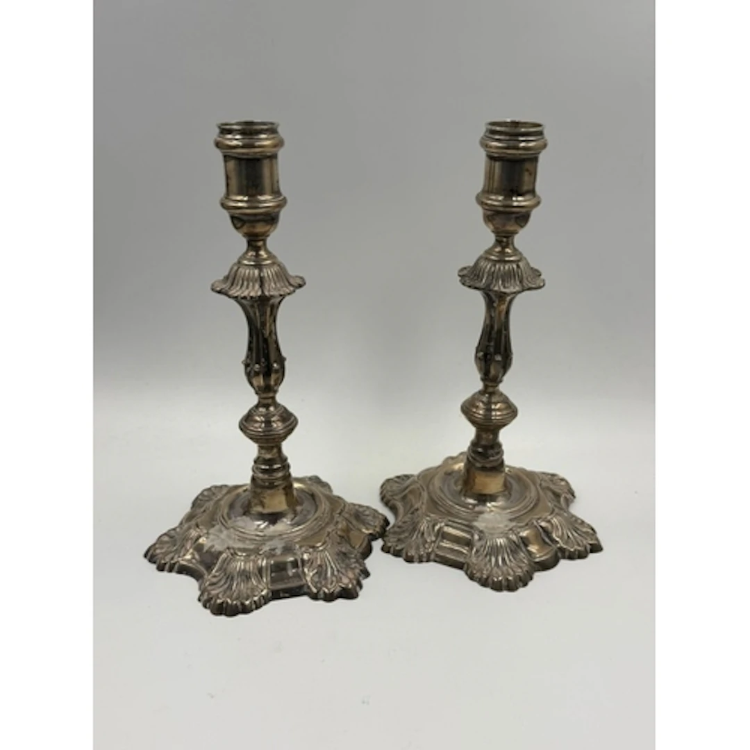 A pair of silver candlesticks knopped baluster stems and sha...